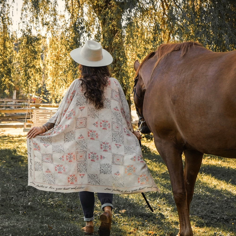
                  
                    Model wearing romantic kimono with patchwork pattern made from a 200-year-old puzzle purse love letter featuring handwritten poetry and vintage florals – Market of Stars
                  
                