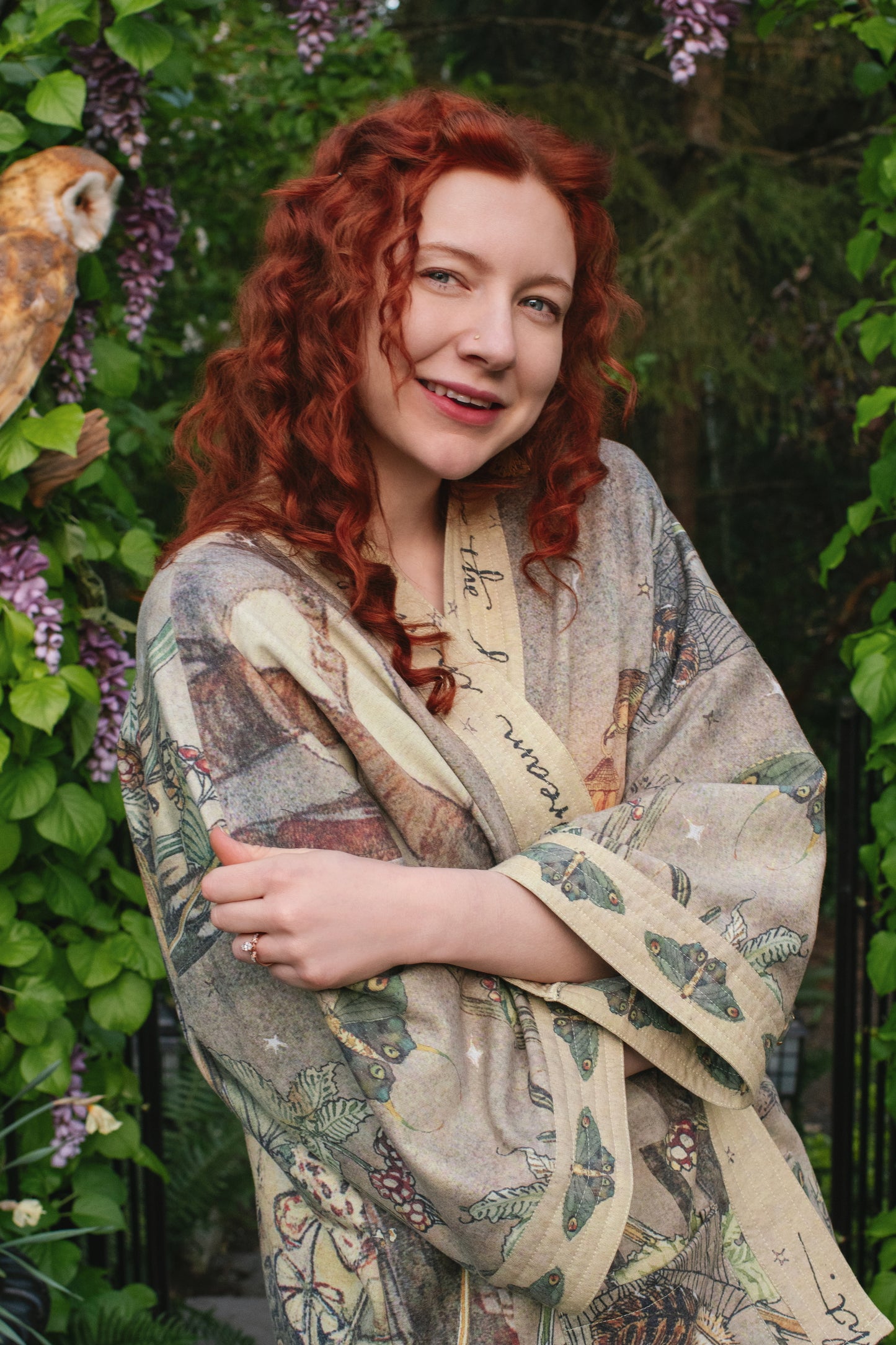 Model wearing the Lovelight Cottage Cardigan ft artwork by world-renowned illustrator Charles van Sandwyk - Market of Stars