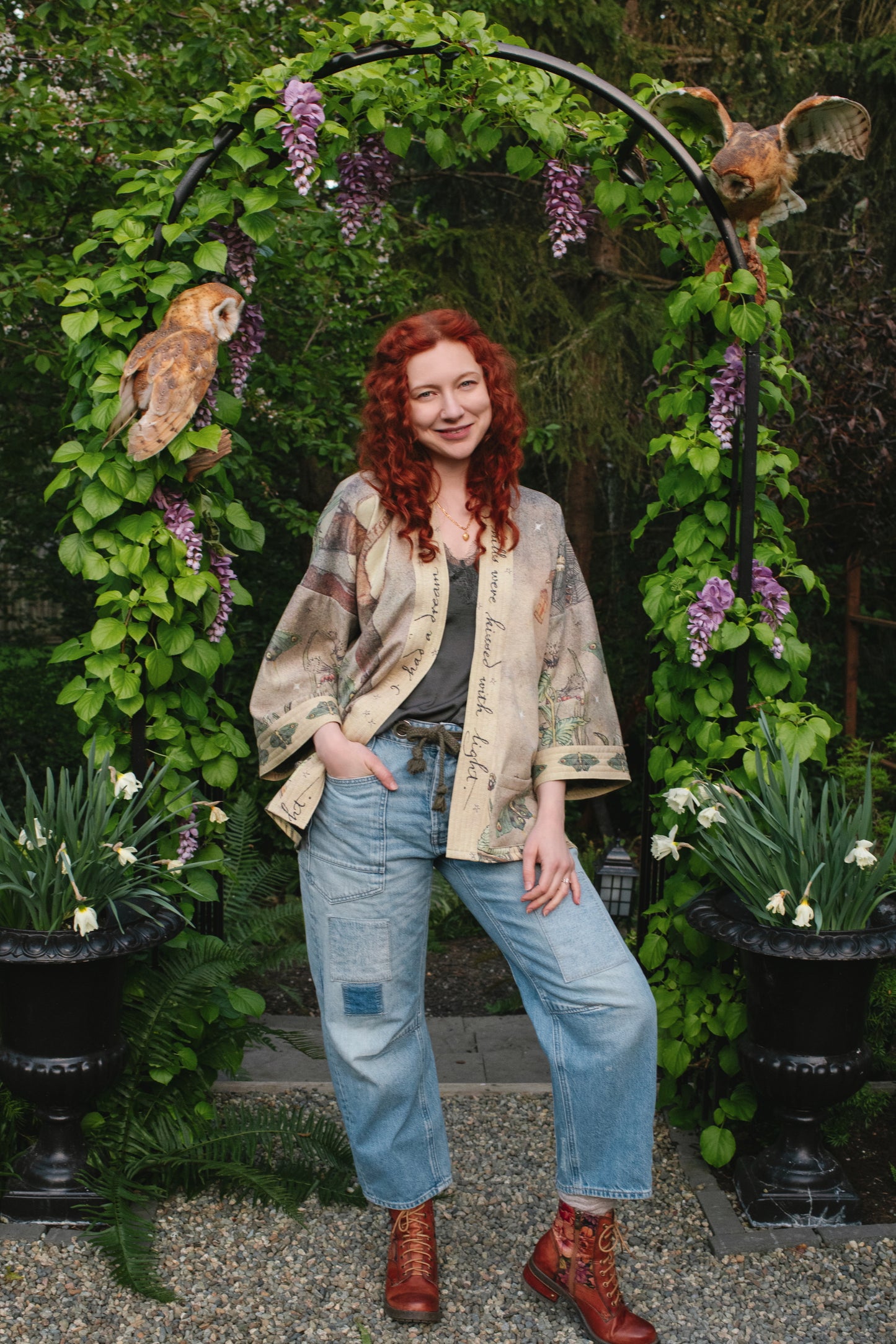 Model wearing the Lovelight Cottage Cardigan ft artwork by world-renowned illustrator Charles van Sandwyk - Market of Stars