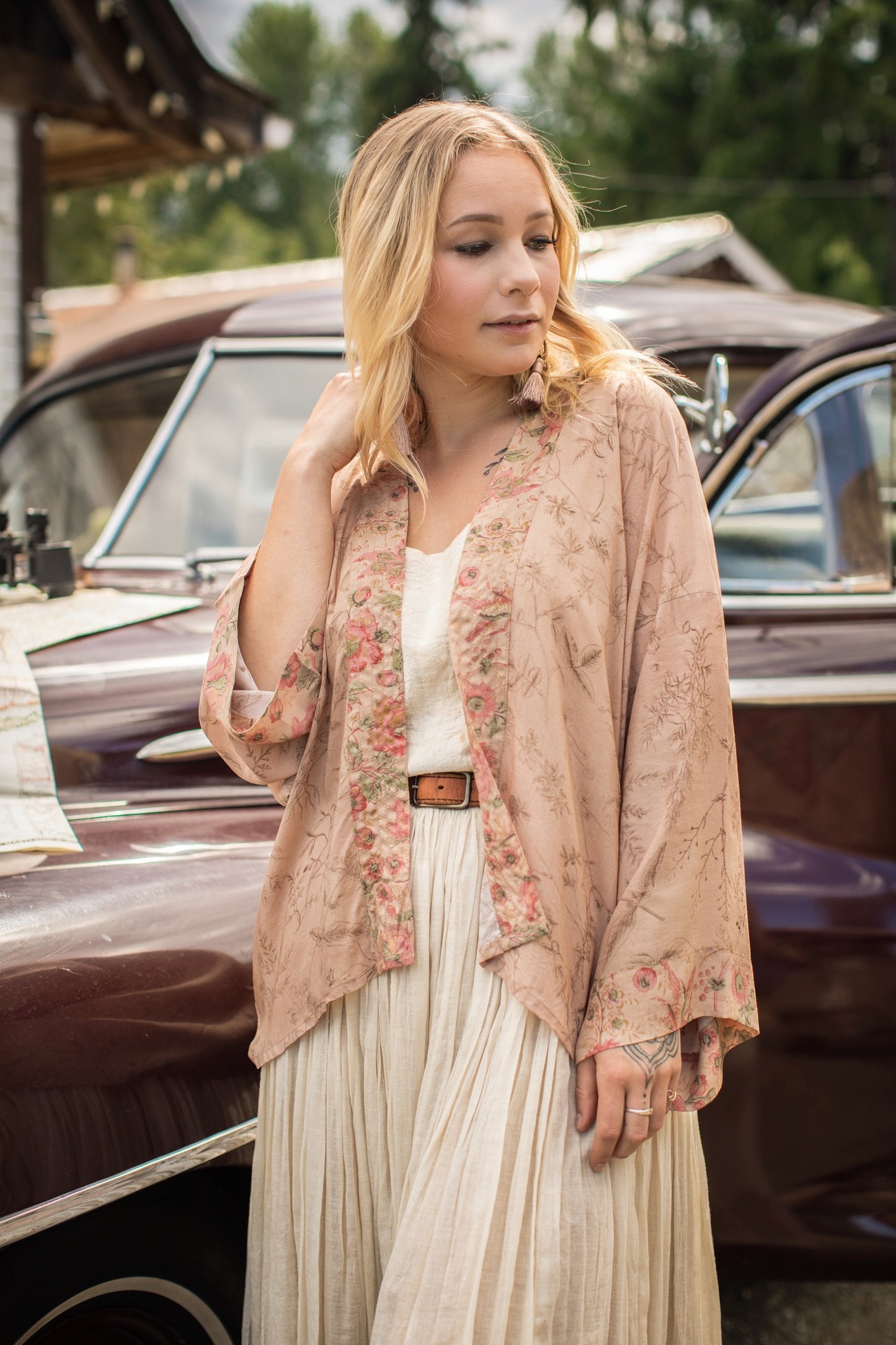 Model wearing map print kimono featuring a reimagined 1846 artwork titled A Map of the Open Country of a Woman’s Heart – Market of Stars