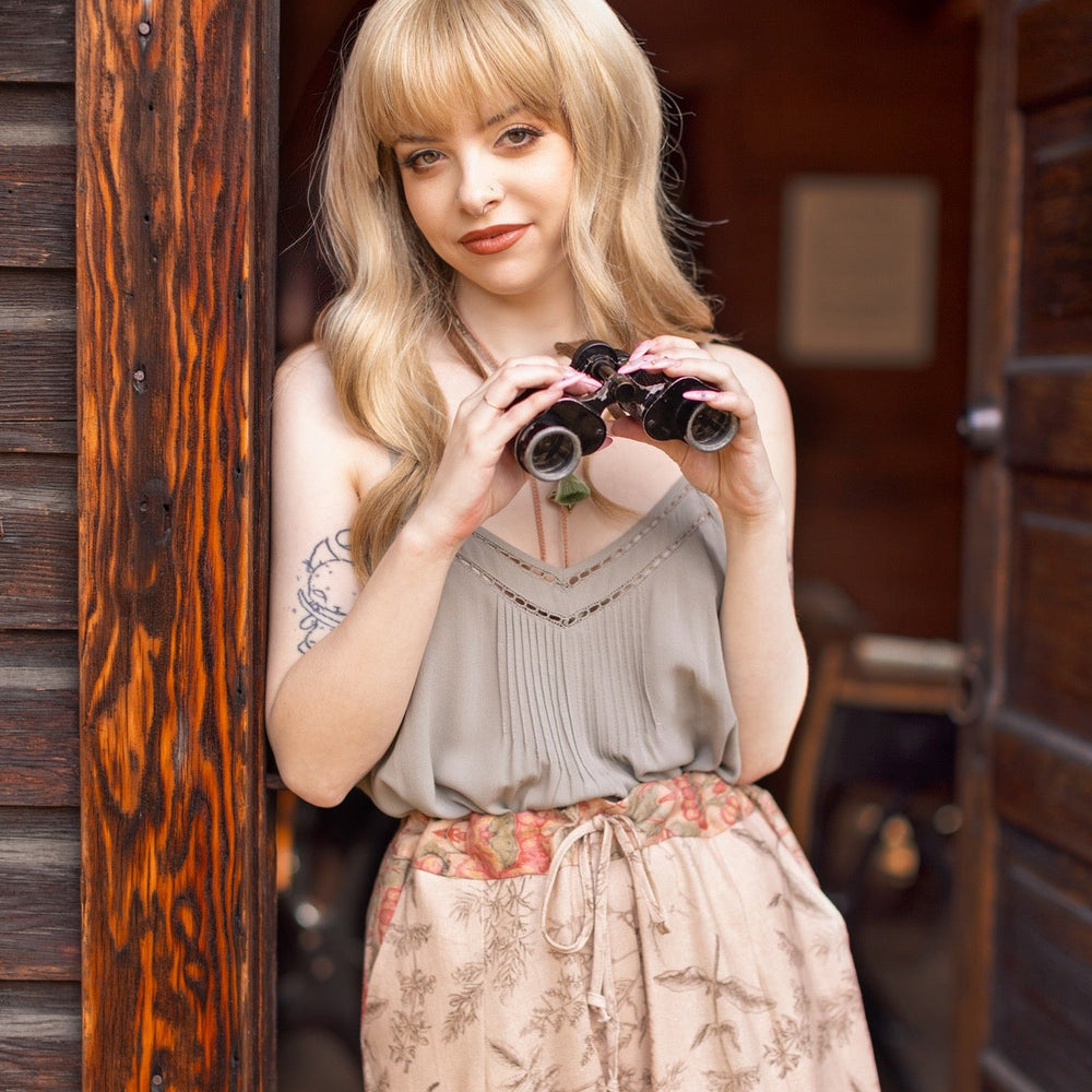 
                  
                    Model wearing artist pants in oat featuring reimagined vintage 1846 map of a woman’s heart with playful updated place names – Market of Stars
                  
                