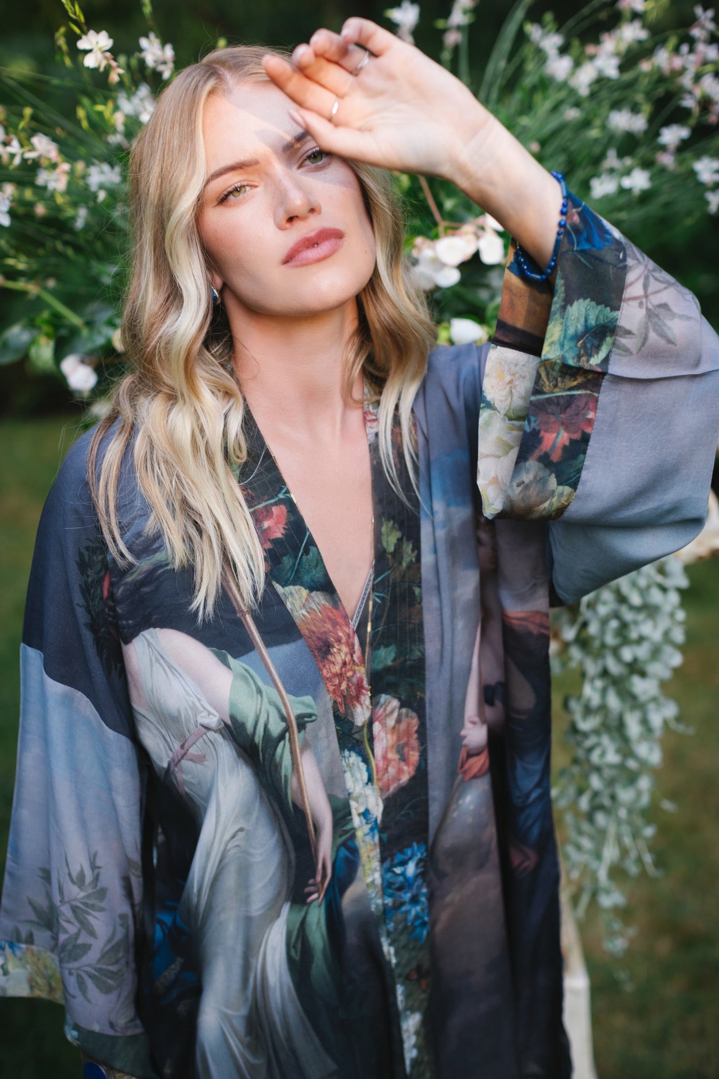 Model wearing Peace, Wine & Sunshine Bohéme Slip Dress featuring botanical collages and playful peace, wine and sunshine lettering on the hem – Market of Stars.