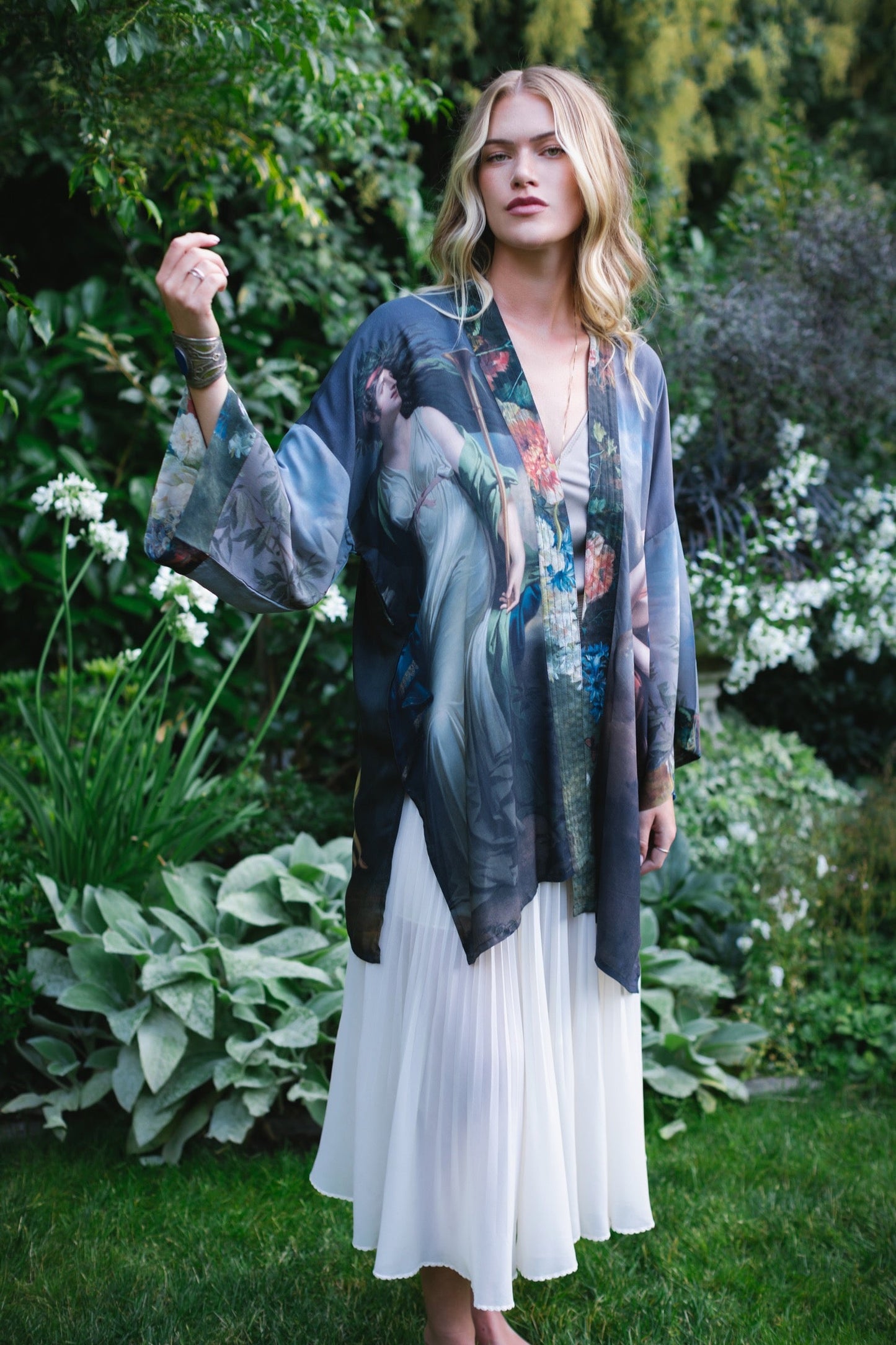 Model wearing Peace, Wine & Sunshine Bohéme Slip Dress featuring botanical collages and playful peace, wine and sunshine lettering on the hem – Market of Stars.
