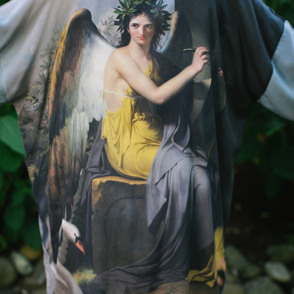 
                  
                    Model wearing Peace, Wine & Sunshine Bohéme Slip Dress featuring botanical collages and playful peace, wine and sunshine lettering on the hem – Market of Stars.
                  
                
