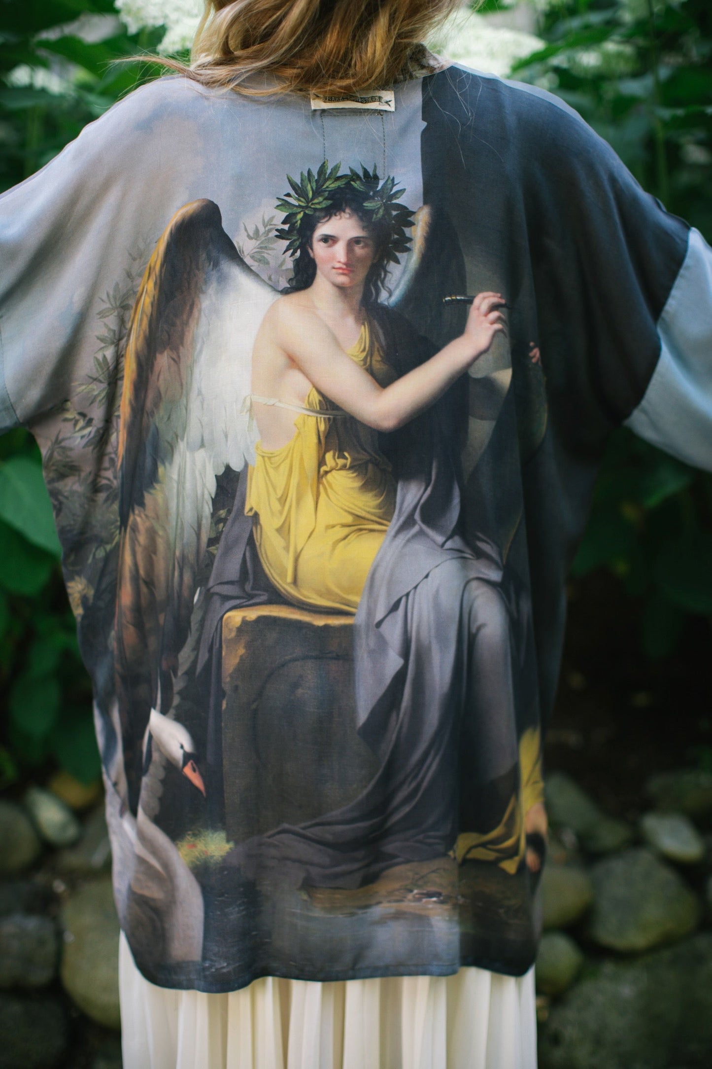 Model wearing Peace, Wine & Sunshine Bohéme Slip Dress featuring botanical collages and playful peace, wine and sunshine lettering on the hem – Market of Stars.