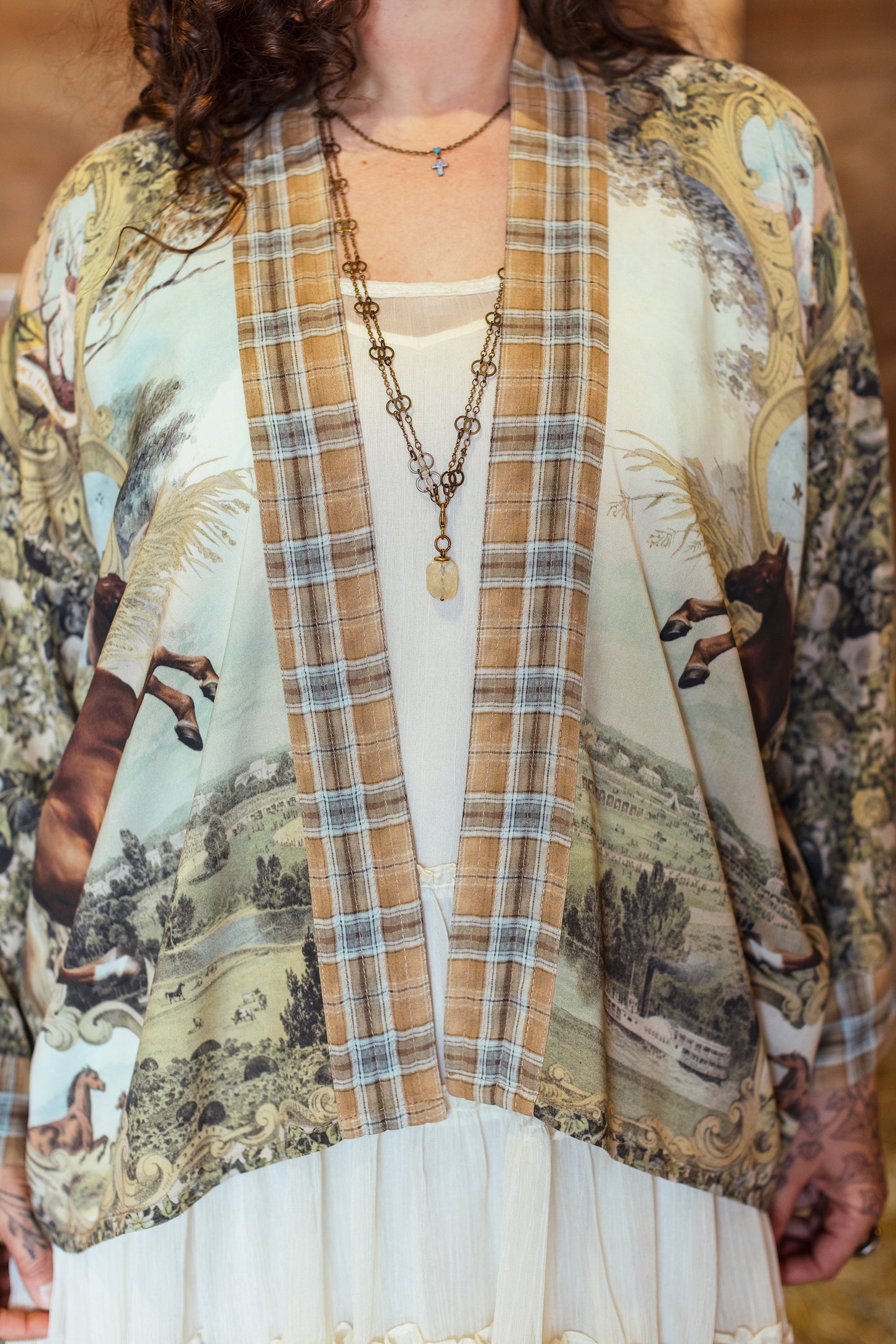 Model wearing a bamboo-viscose cropped kimono duster made for everyday adventures with a whimsical print celebrating one's unbridled spirit of adventure - Market of Stars