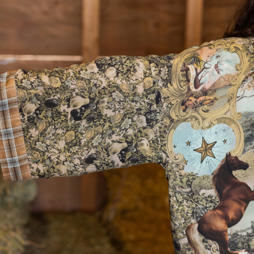 
                  
                    Model wearing a bamboo-viscose cropped kimono duster made for everyday adventures with a whimsical print celebrating one's unbridled spirit of adventure - Market of Stars
                  
                