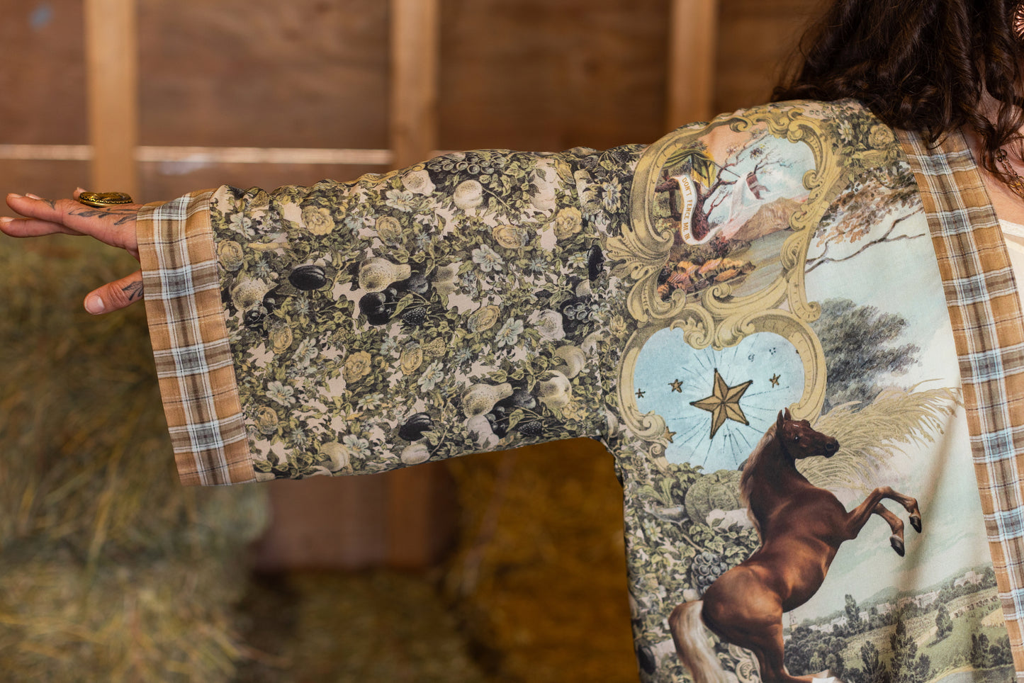 Model wearing a bamboo-viscose cropped kimono duster made for everyday adventures with a whimsical print celebrating one's unbridled spirit of adventure - Market of Stars