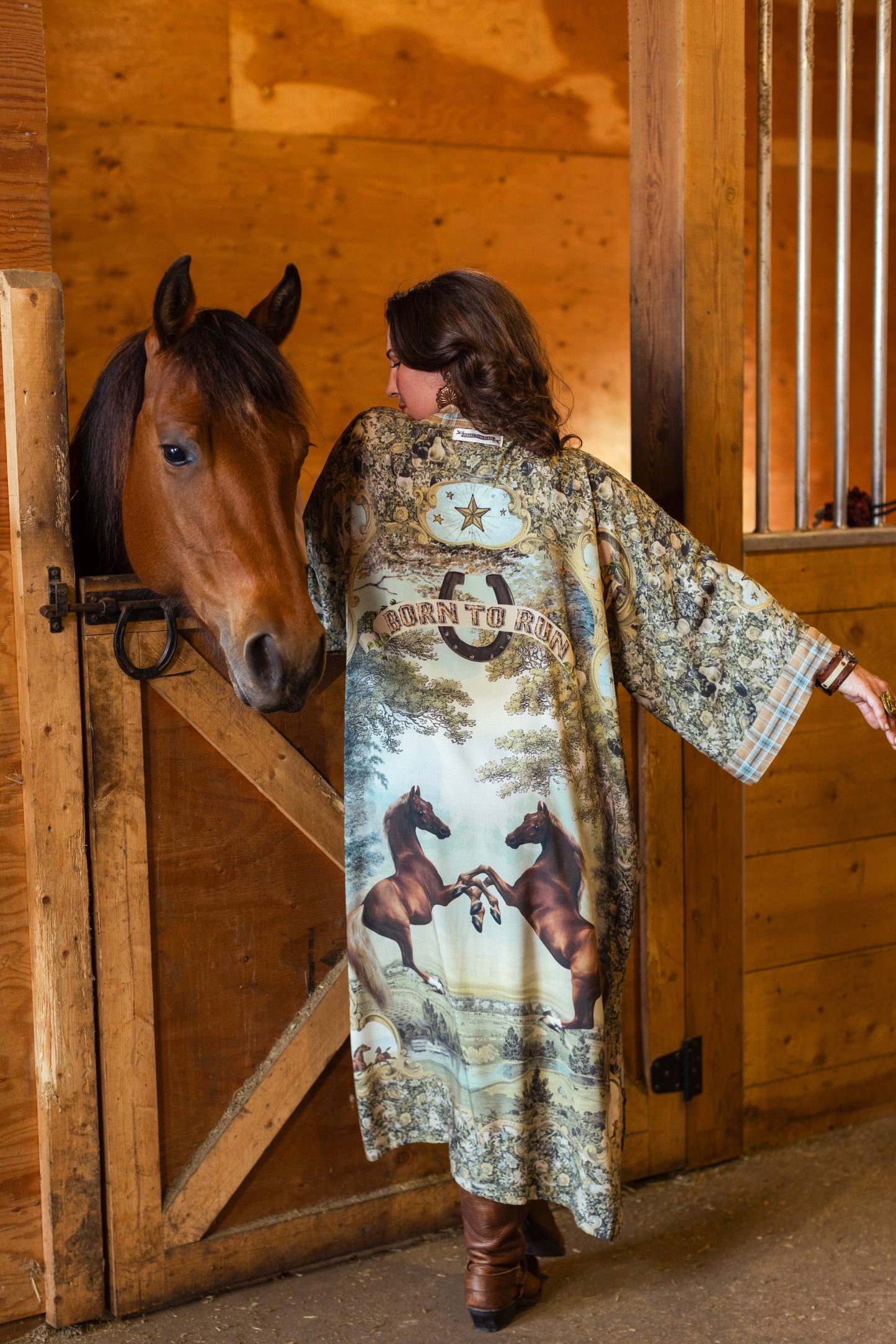 Model wearing a bamboo-viscose kimono duster robe made for everyday adventures with a whimsical print celebrating one's unbridled spirit of adventure - Market of Stars