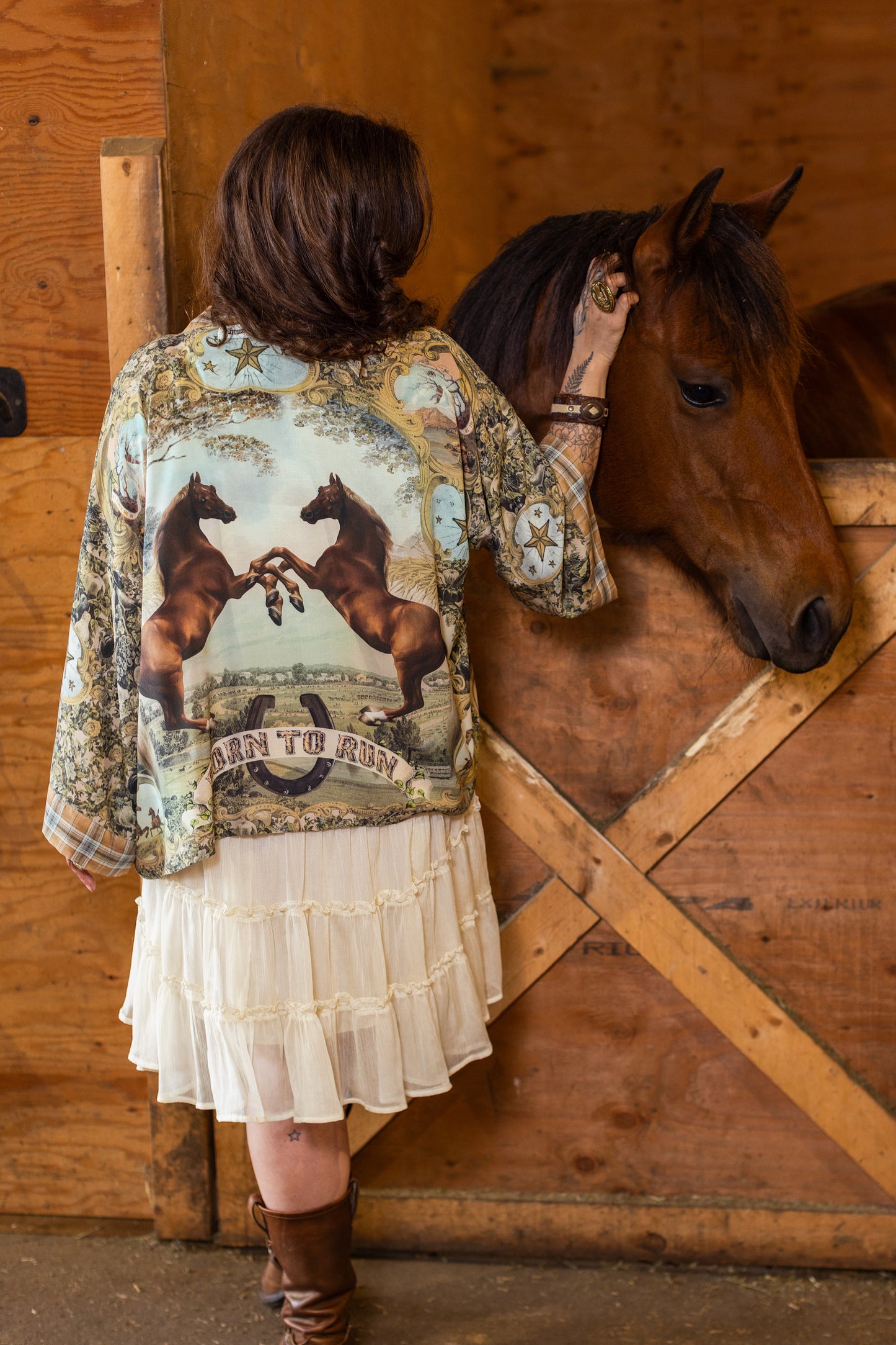 Model wearing a bamboo-viscose cropped kimono duster made for everyday adventures with a whimsical print celebrating one's unbridled spirit of adventure - Market of Stars