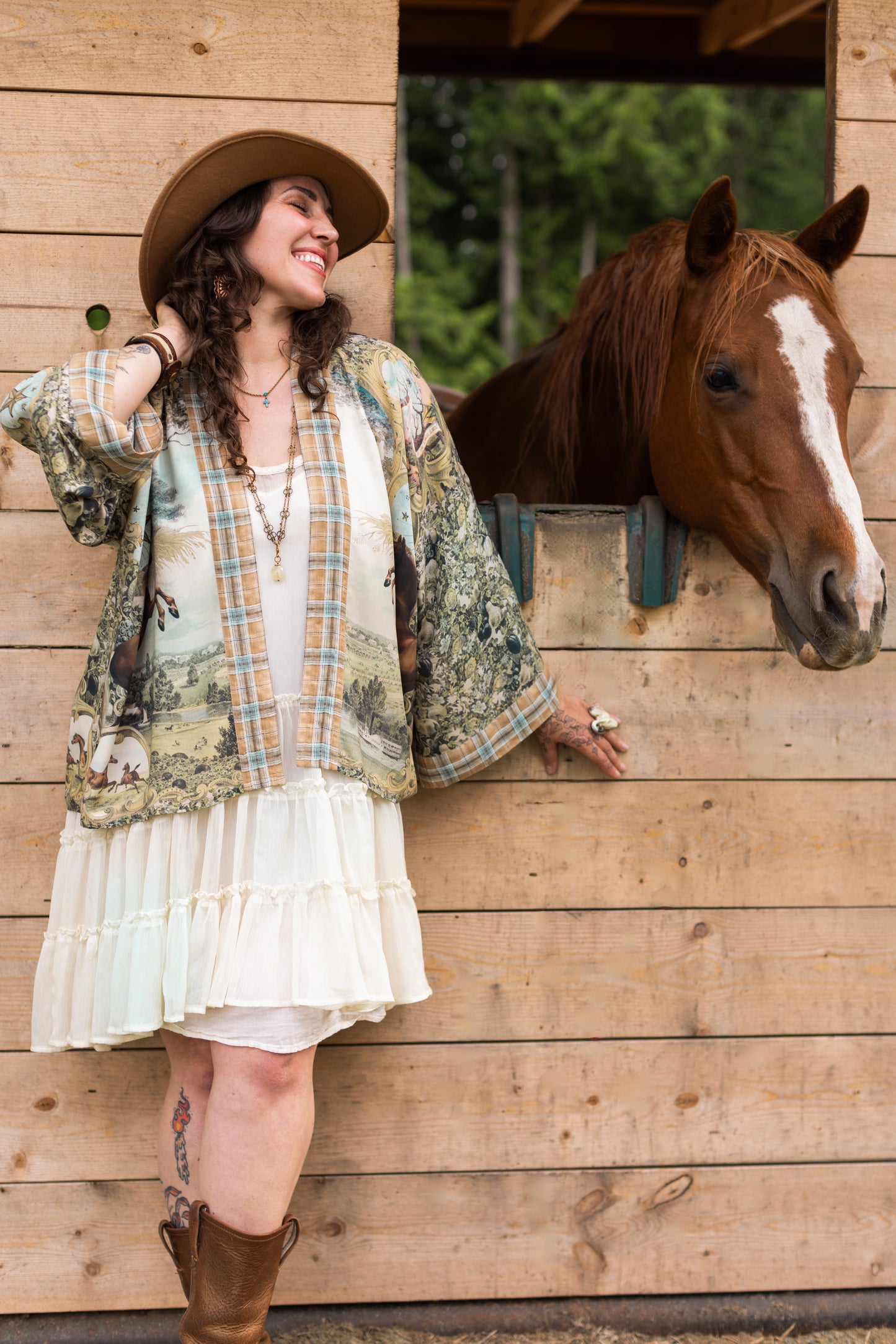 Model wearing a bamboo-viscose cropped kimono duster made for everyday adventures with a whimsical print celebrating one's unbridled spirit of adventure - Market of Stars