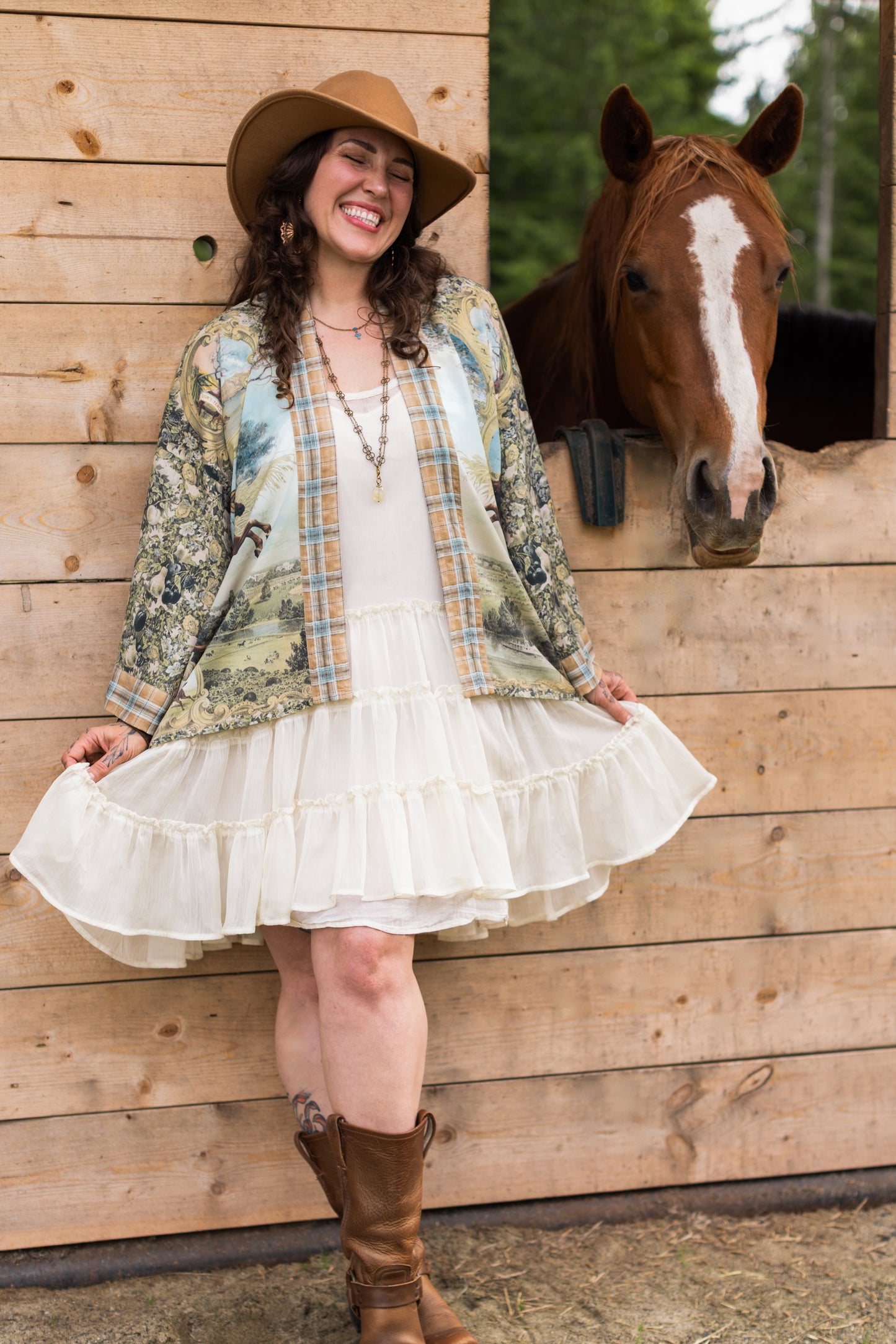 Model wearing a bamboo-viscose cropped kimono duster made for everyday adventures with a whimsical print celebrating one's unbridled spirit of adventure - Market of Stars