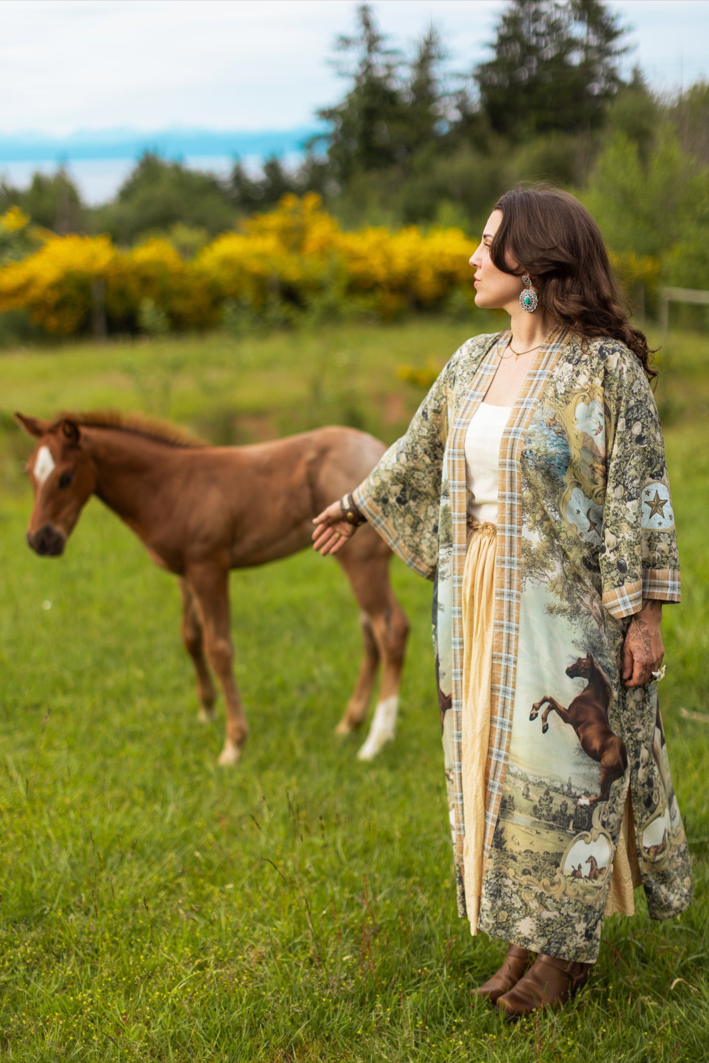 Model wearing a bamboo-viscose kimono duster robe made for everyday adventures with a whimsical print celebrating one's unbridled spirit of adventure - Market of Stars
