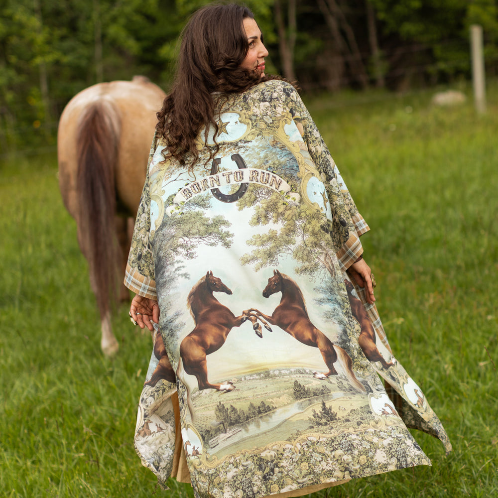 Model wearing a bamboo-viscose kimono duster robe made for everyday adventures with a whimsical print celebrating one's unbridled spirit of adventure - Market of Stars