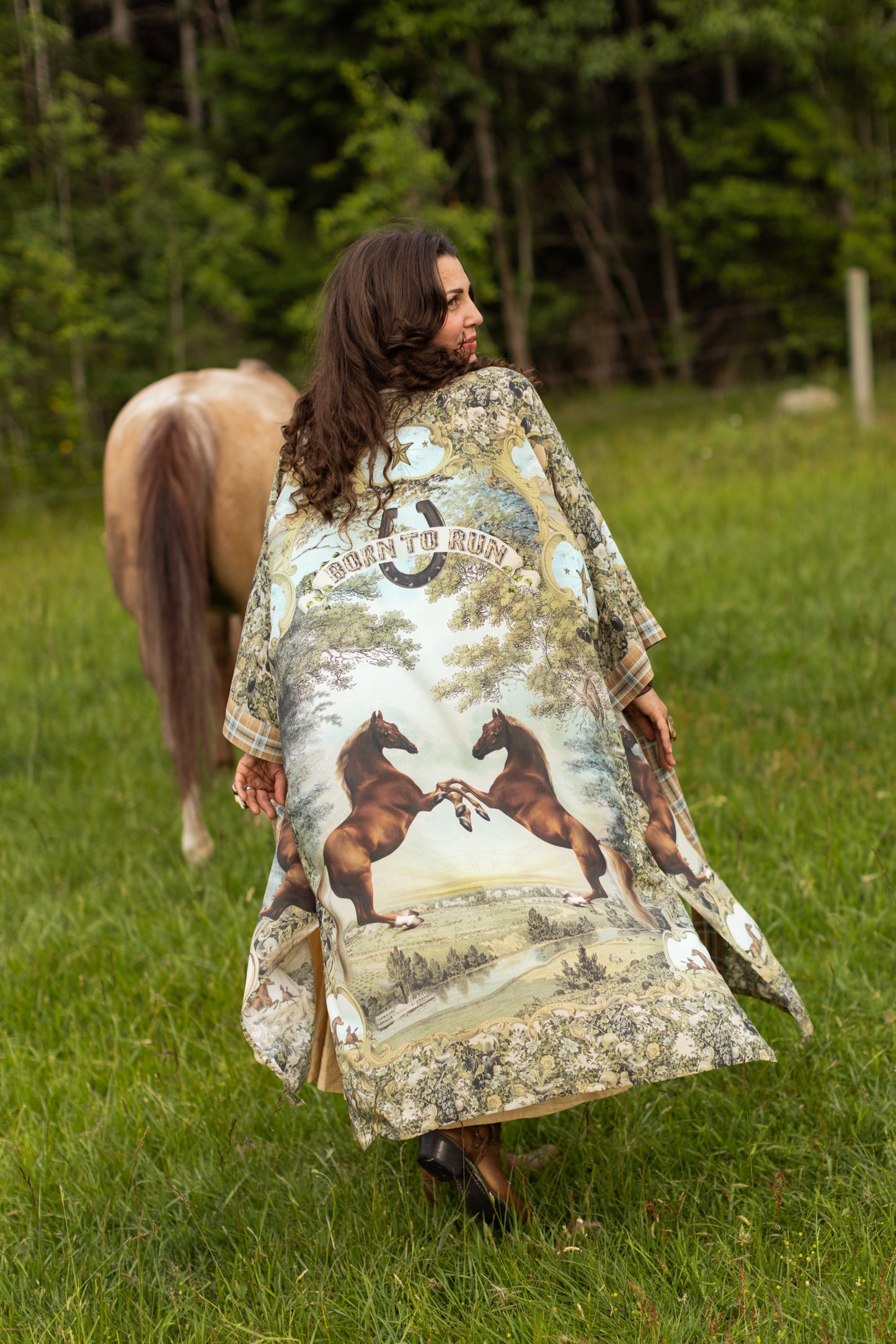 Model wearing a bamboo-viscose kimono duster robe made for everyday adventures with a whimsical print celebrating one's unbridled spirit of adventure - Market of Stars