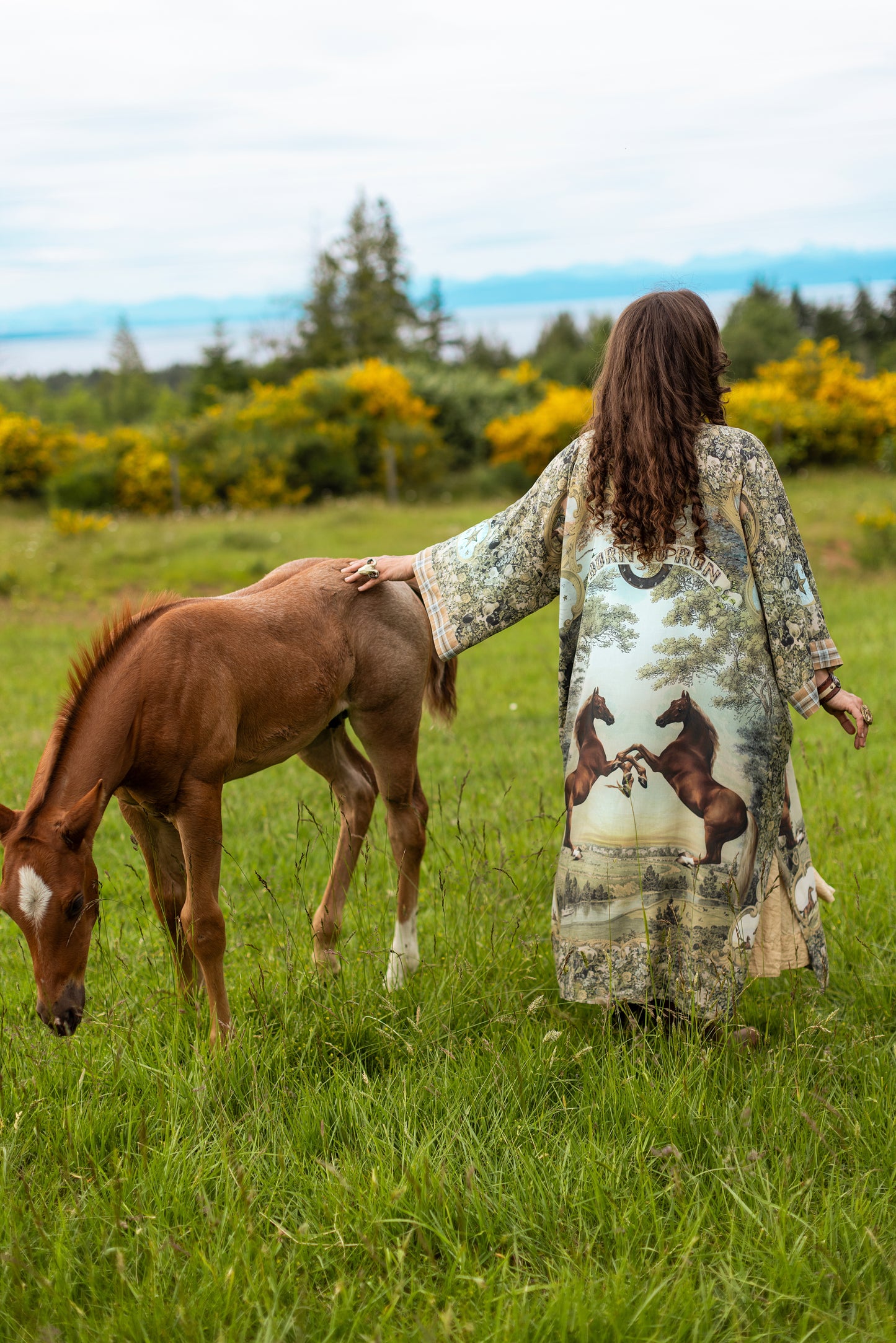 Model wearing a bamboo-viscose kimono duster robe made for everyday adventures with a whimsical print celebrating one's unbridled spirit of adventure - Market of Stars