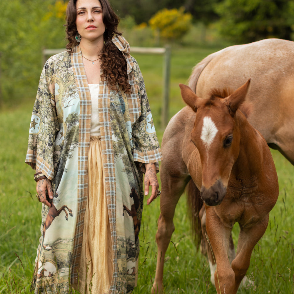 Model wearing a bamboo-viscose kimono duster robe made for everyday adventures with a whimsical print celebrating one's unbridled spirit of adventure - Market of Stars