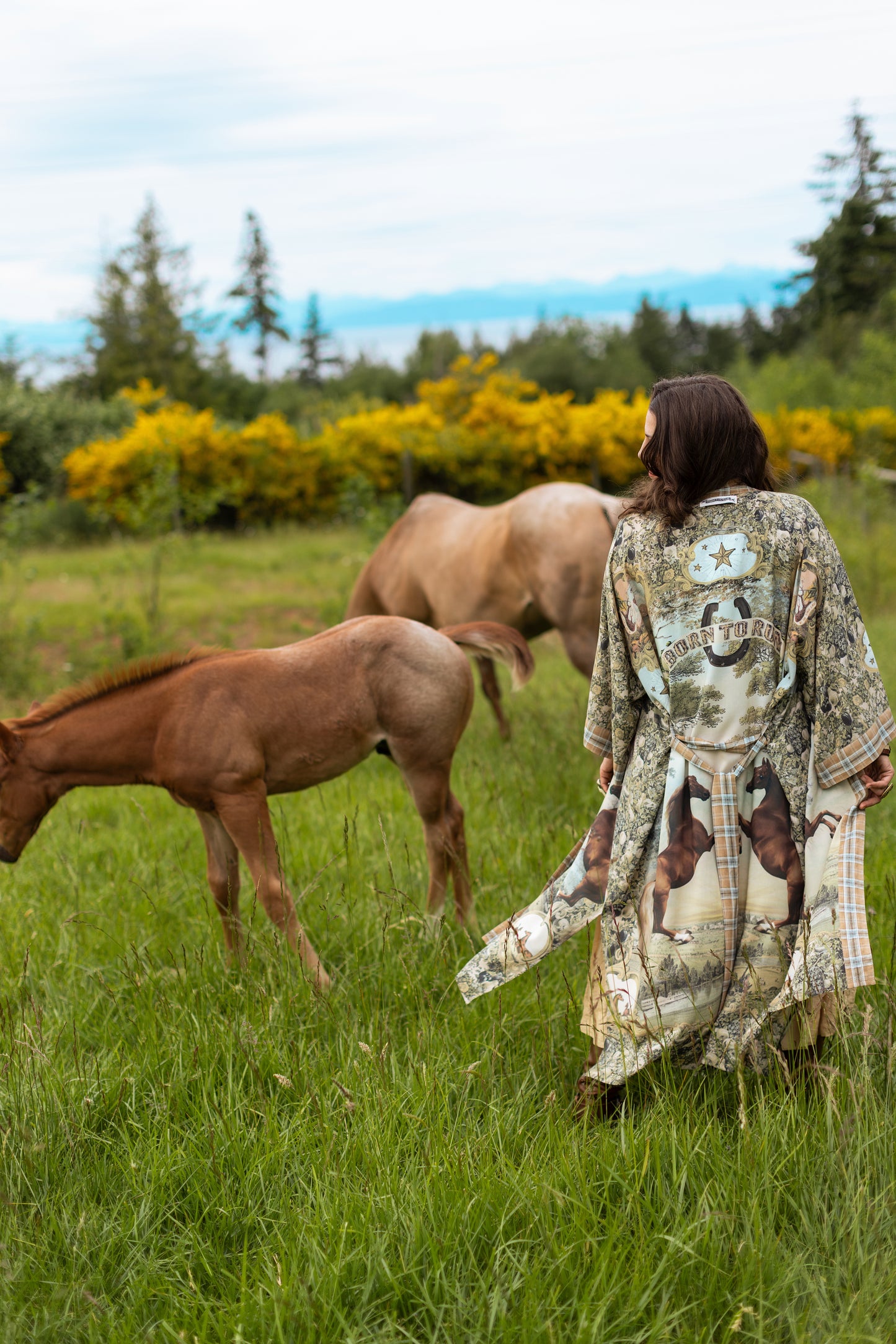 Model wearing a bamboo-viscose kimono duster robe made for everyday adventures with a whimsical print celebrating one's unbridled spirit of adventure - Market of Stars