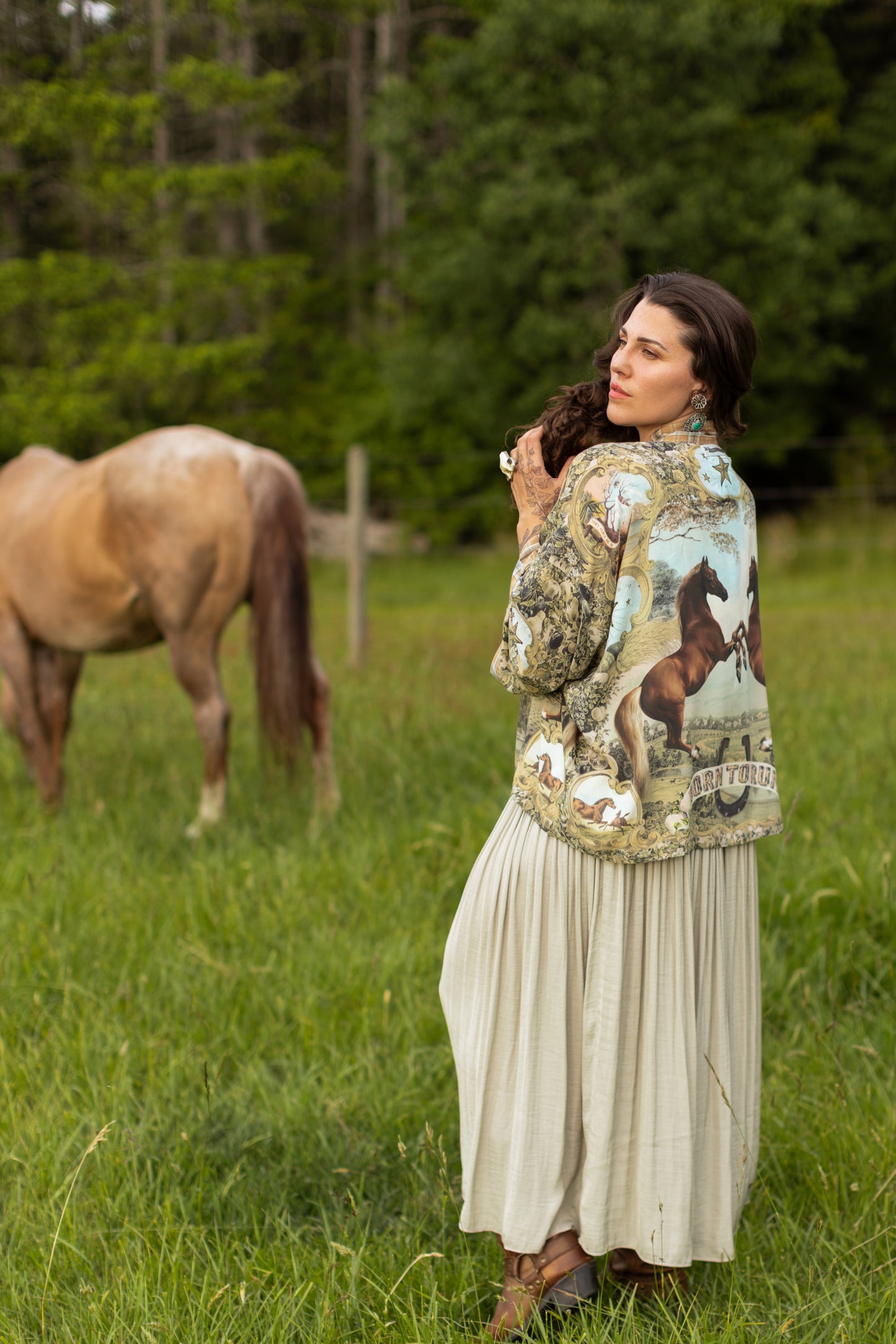 Model wearing a bamboo-viscose cropped kimono duster made for everyday adventures with a whimsical print celebrating one's unbridled spirit of adventure - Market of Stars