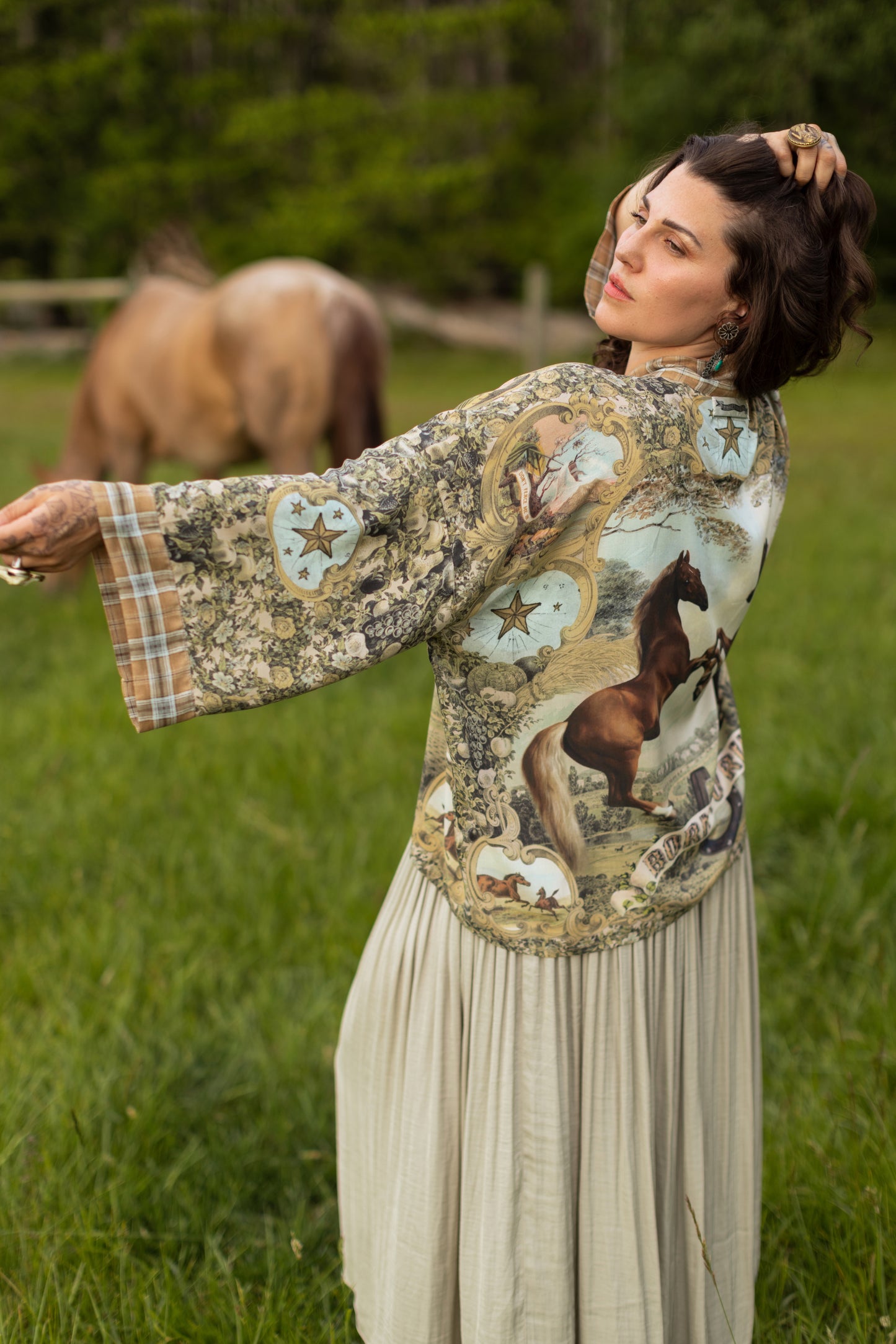 Model wearing a bamboo-viscose cropped kimono duster made for everyday adventures with a whimsical print celebrating one's unbridled spirit of adventure - Market of Stars