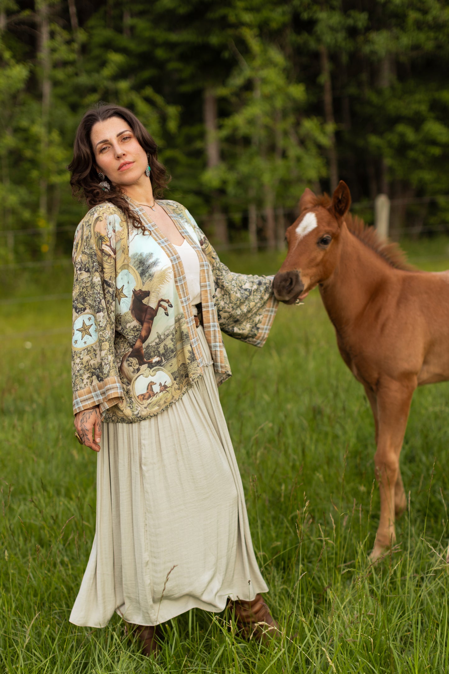 Model wearing a bamboo-viscose cropped kimono duster made for everyday adventures with a whimsical print celebrating one's unbridled spirit of adventure - Market of Stars