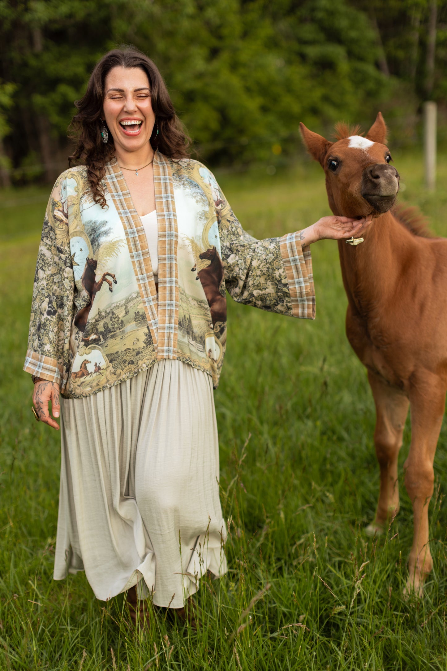 Model wearing a bamboo-viscose cropped kimono duster made for everyday adventures with a whimsical print celebrating one's unbridled spirit of adventure - Market of Stars