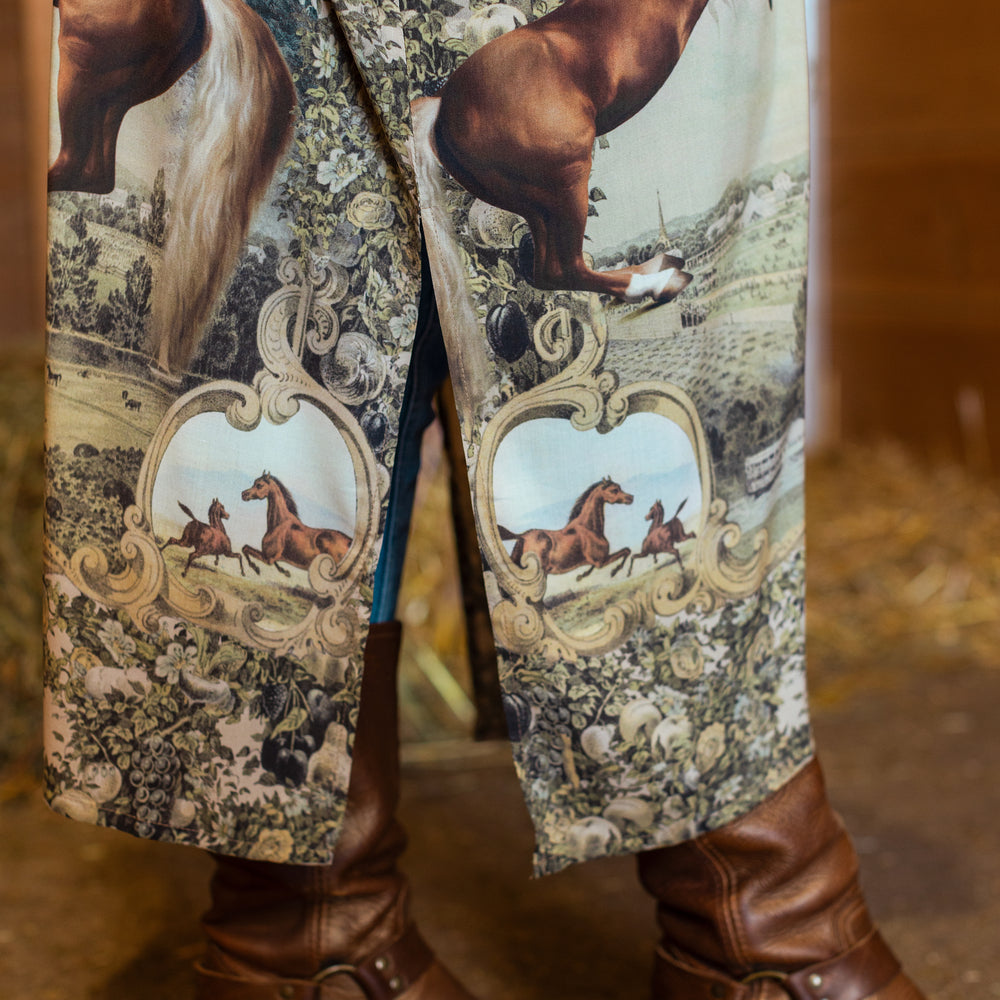
                  
                    Model wearing a bamboo-viscose kimono duster robe made for everyday adventures with a whimsical print celebrating one's unbridled spirit of adventure - Market of Stars
                  
                