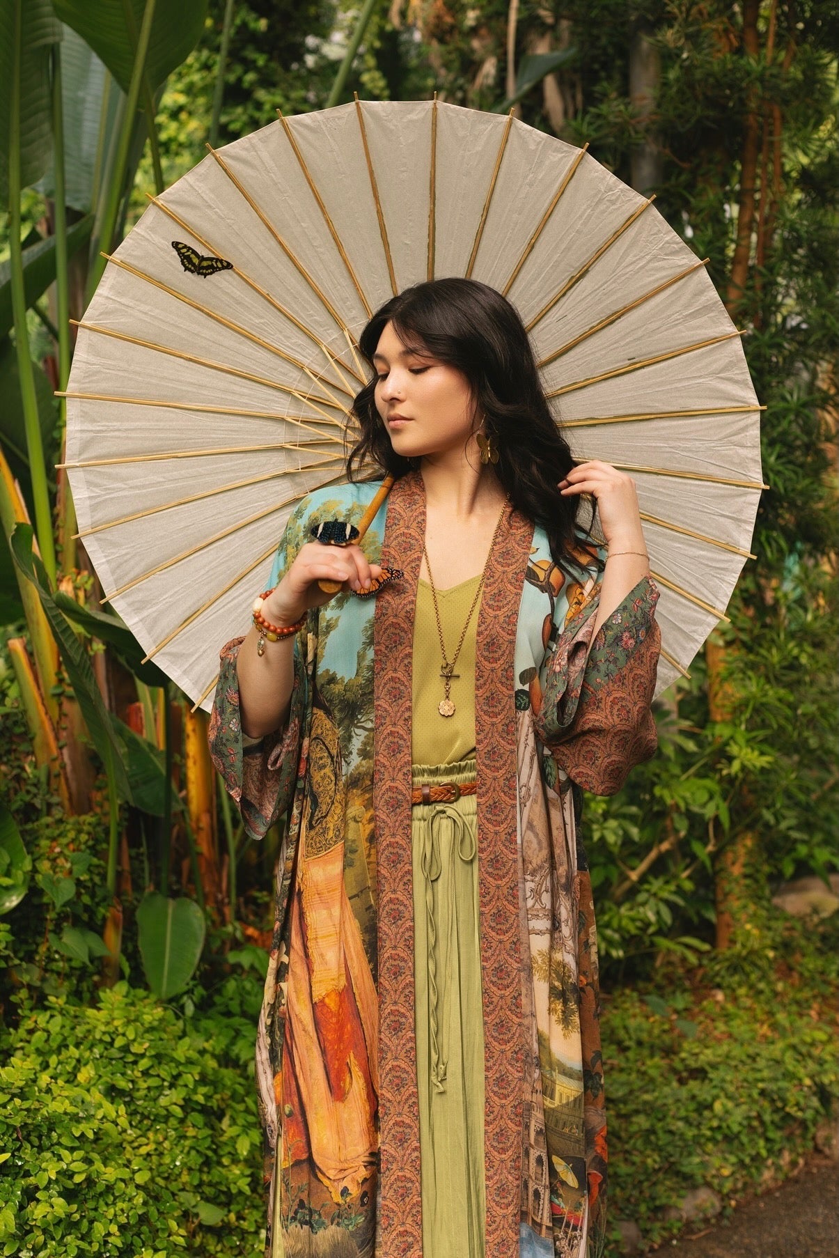 Model wearing Peace, Wine & Sunshine Bohéme Slip Dress featuring botanical collages and playful peace, wine and sunshine lettering on the hem – Market of Stars.