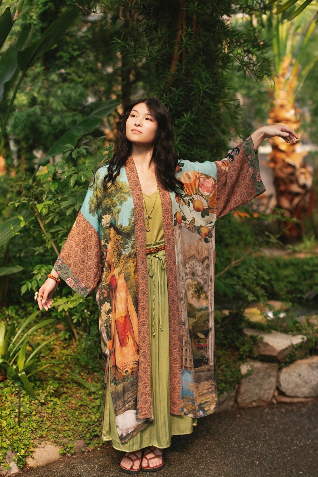 Model wearing Peace, Wine & Sunshine Bohéme Slip Dress featuring botanical collages and playful peace, wine and sunshine lettering on the hem – Market of Stars.