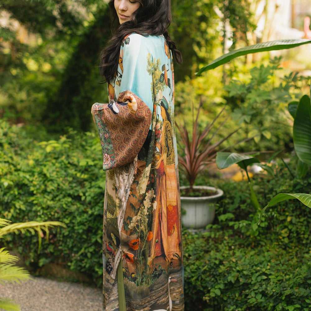 
                  
                    Model wearing Peace, Wine & Sunshine Bohéme Slip Dress featuring botanical collages and playful peace, wine and sunshine lettering on the hem – Market of Stars.
                  
                