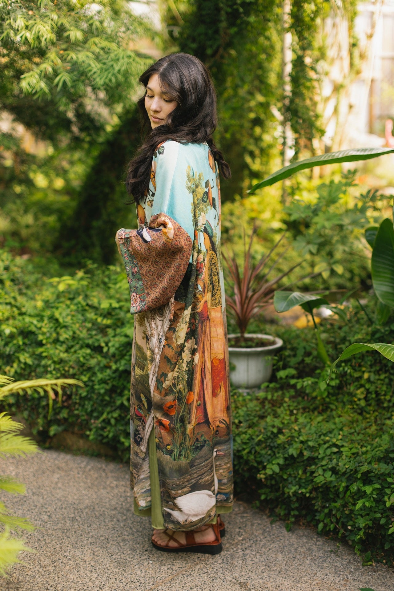 Model wearing Peace, Wine & Sunshine Bohéme Slip Dress featuring botanical collages and playful peace, wine and sunshine lettering on the hem – Market of Stars.