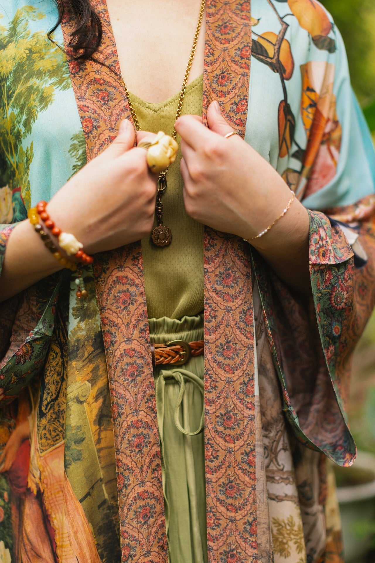 Model wearing Peace, Wine & Sunshine Bohéme Slip Dress featuring botanical collages and playful peace, wine and sunshine lettering on the hem – Market of Stars.