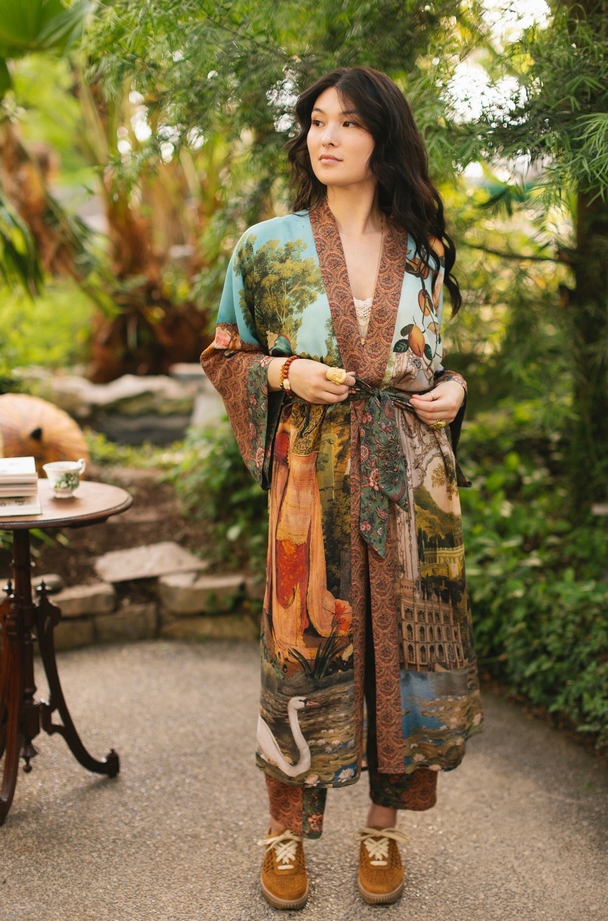 Model wearing Peace, Wine & Sunshine Bohéme Slip Dress featuring botanical collages and playful peace, wine and sunshine lettering on the hem – Market of Stars.
