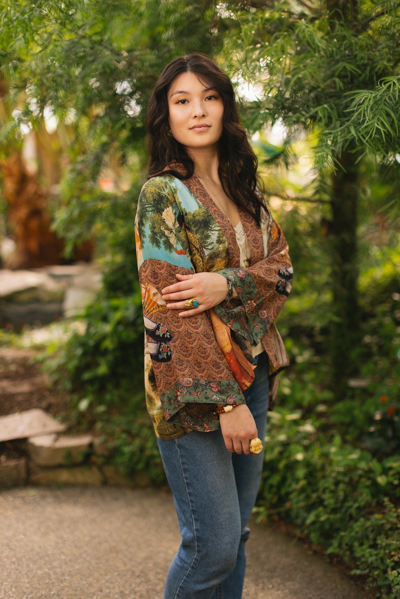 Model wearing Peace, Wine & Sunshine Bohéme Slip Dress featuring botanical collages and playful peace, wine and sunshine lettering on the hem – Market of Stars.
