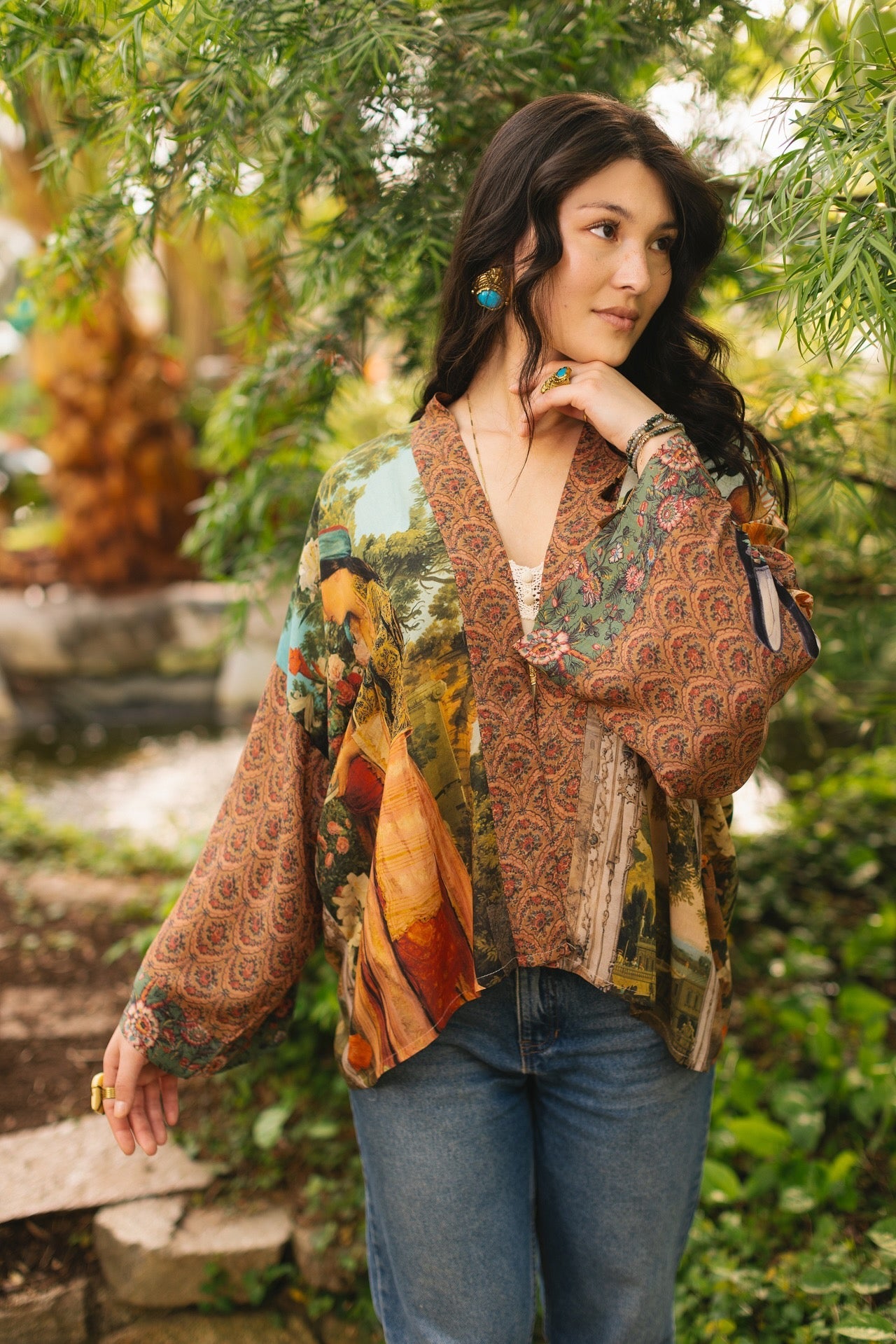 Model wearing Peace, Wine & Sunshine Bohéme Slip Dress featuring botanical collages and playful peace, wine and sunshine lettering on the hem – Market of Stars.