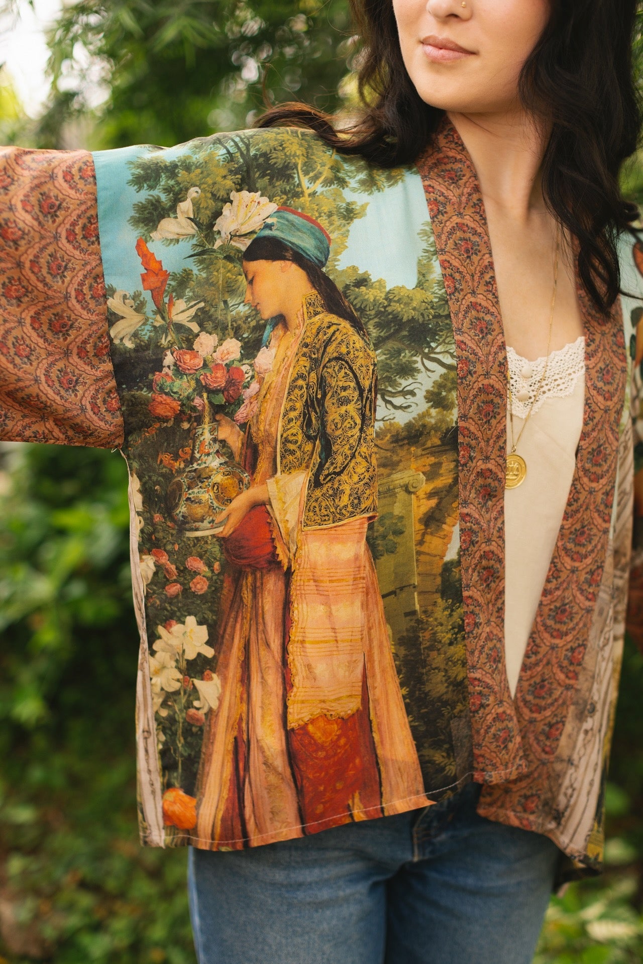Model wearing Peace, Wine & Sunshine Bohéme Slip Dress featuring botanical collages and playful peace, wine and sunshine lettering on the hem – Market of Stars.