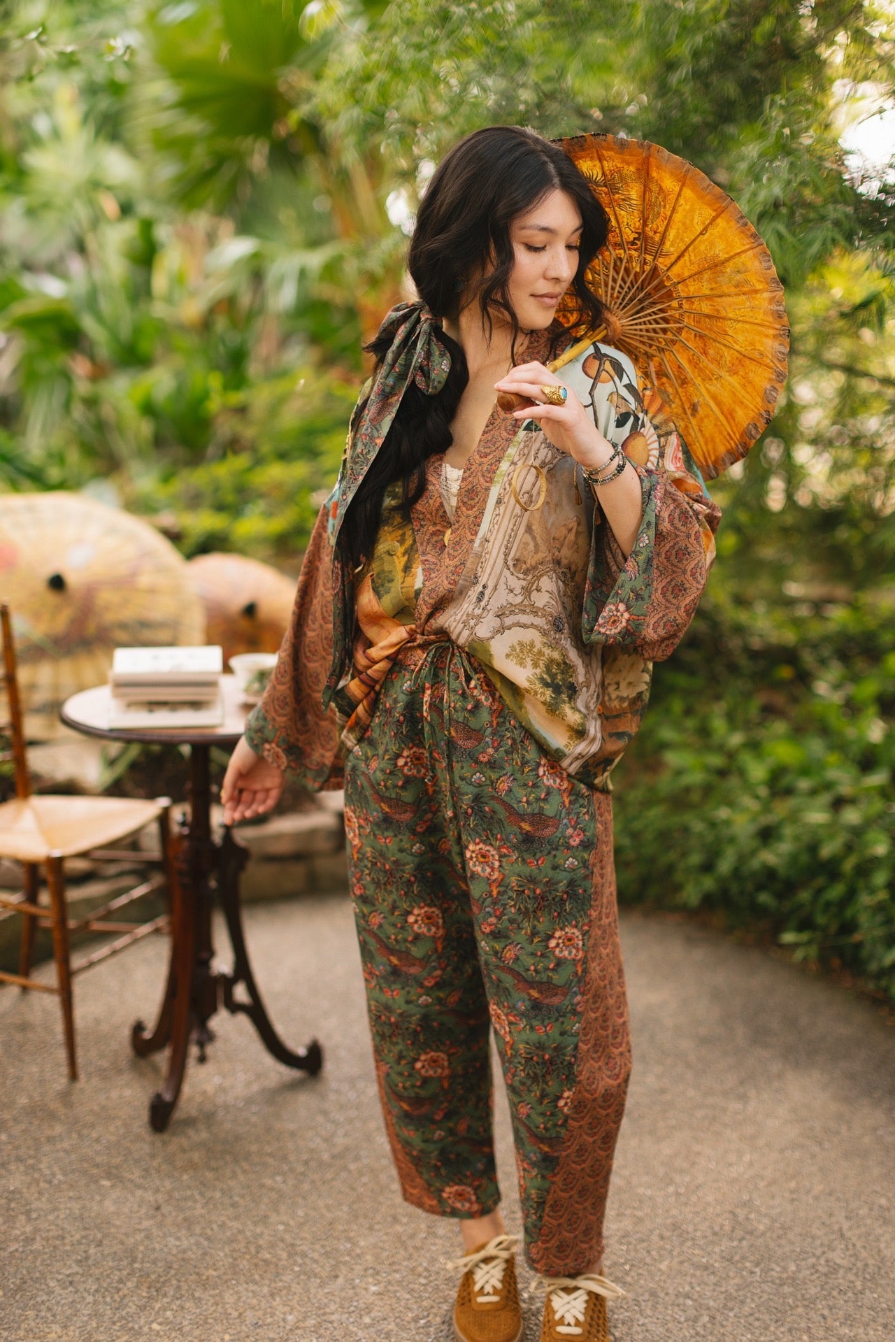 Model wearing Peace, Wine & Sunshine Bohéme Slip Dress featuring botanical collages and playful peace, wine and sunshine lettering on the hem – Market of Stars.
