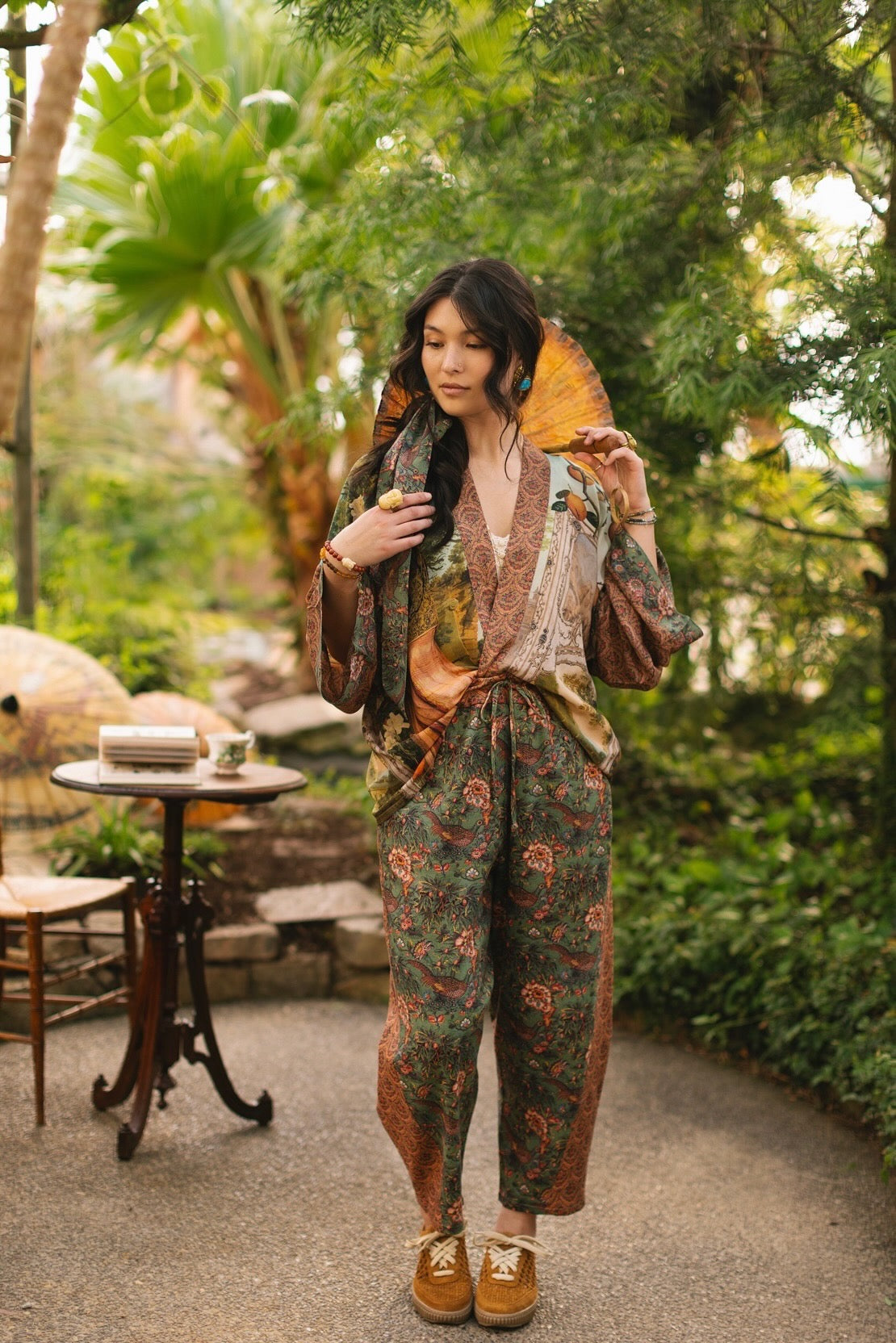 Model wearing Peace, Wine & Sunshine Bohéme Slip Dress featuring botanical collages and playful peace, wine and sunshine lettering on the hem – Market of Stars.