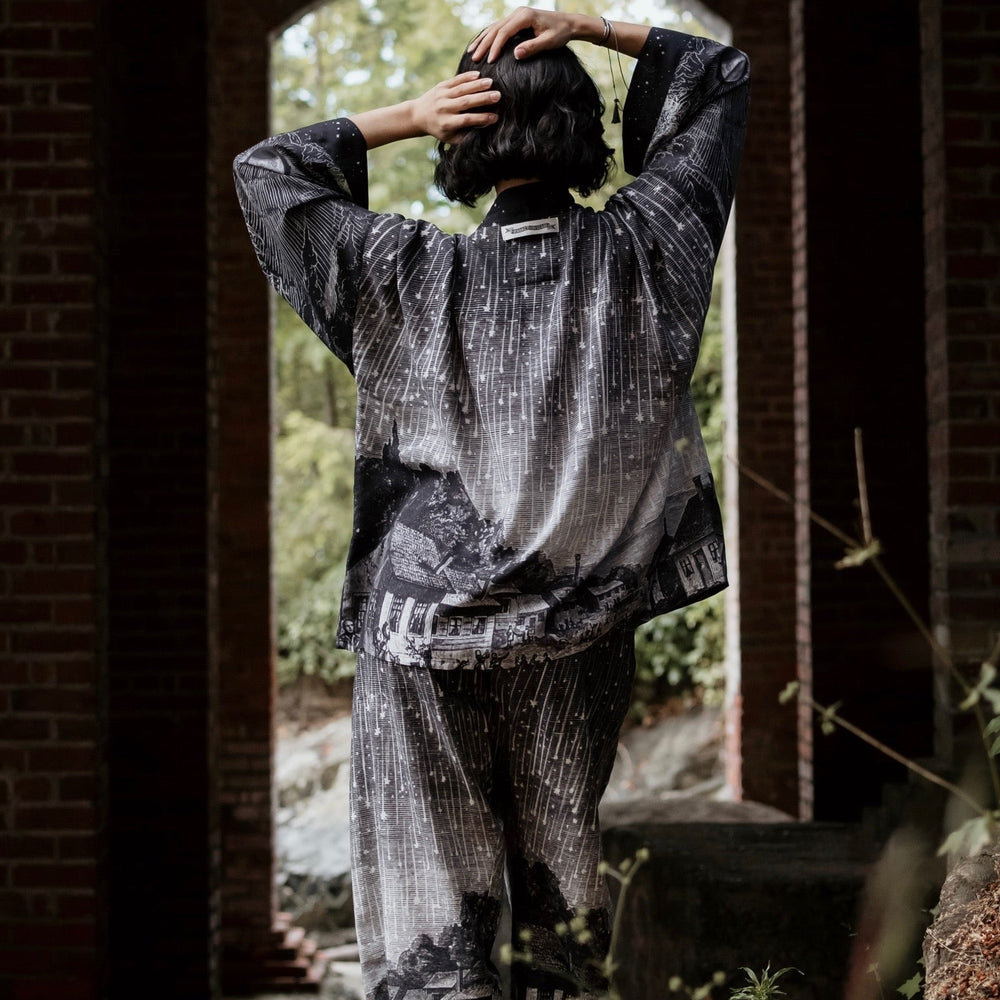 
                  
                    Model wearing our Stargazer cropped kimono featuring an antique engraving of a meteor shower and moonlit astronomy imagery – Market of Stars
                  
                