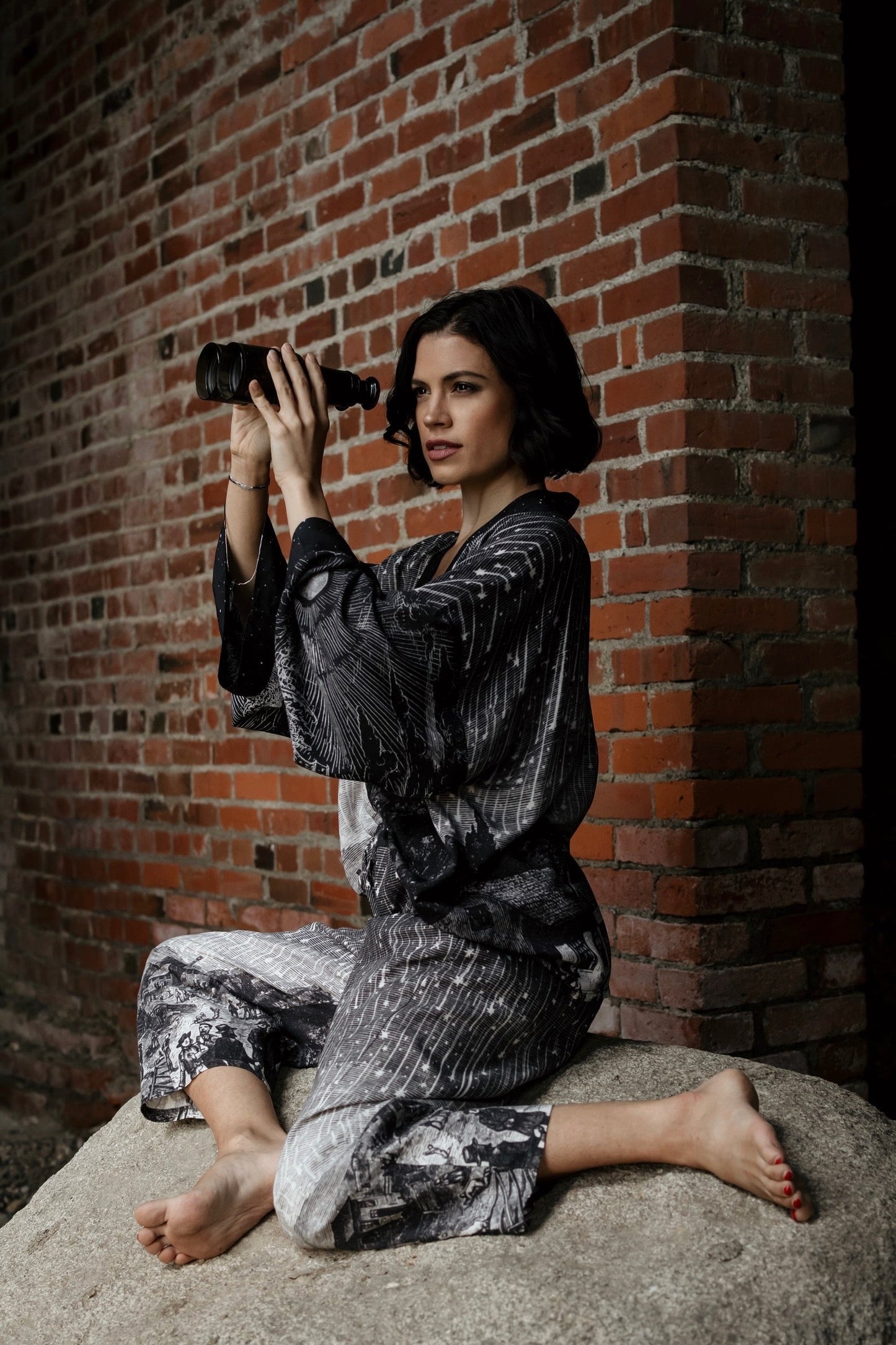 Model wearing Peace, Wine & Sunshine Bohéme Slip Dress featuring botanical collages and playful peace, wine and sunshine lettering on the hem – Market of Stars.