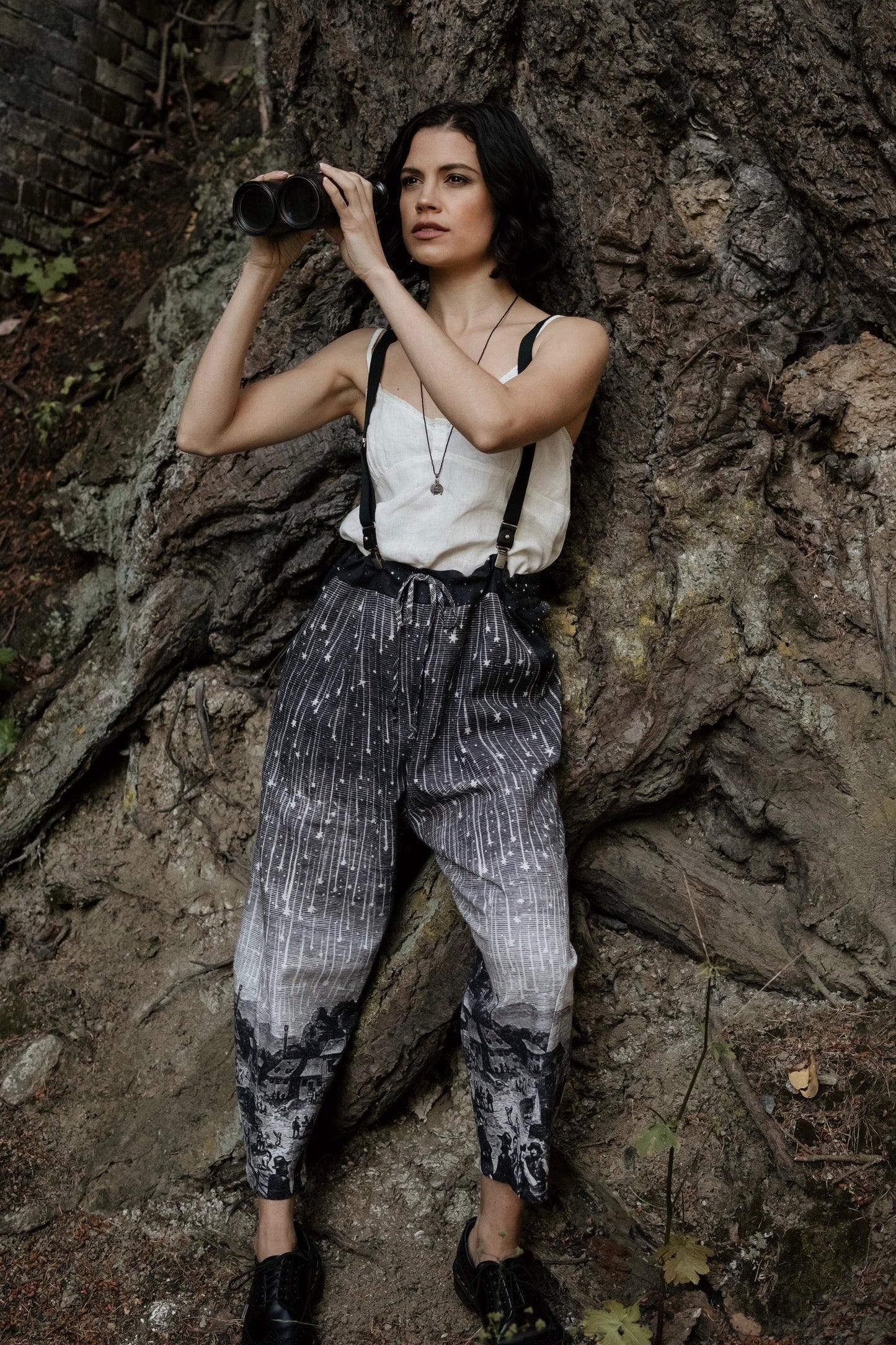 Model wearing Peace, Wine & Sunshine Bohéme Slip Dress featuring botanical collages and playful peace, wine and sunshine lettering on the hem – Market of Stars.