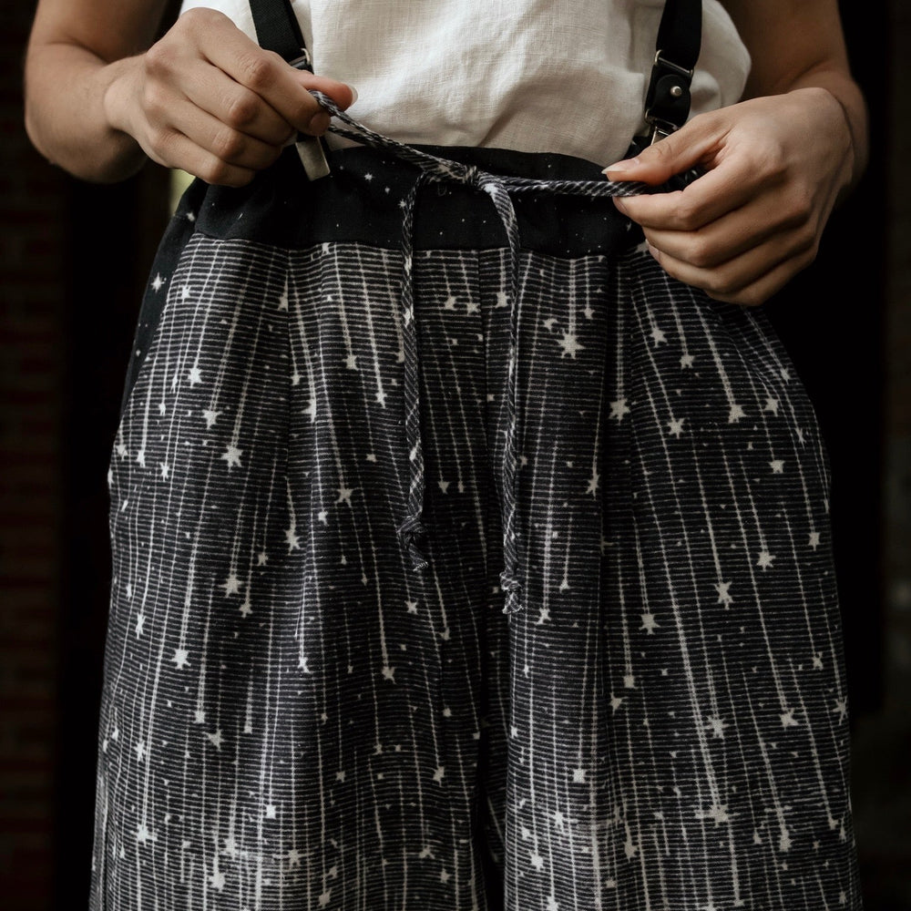 
                  
                    Model wearing Peace, Wine & Sunshine Bohéme Slip Dress featuring botanical collages and playful peace, wine and sunshine lettering on the hem – Market of Stars.
                  
                
