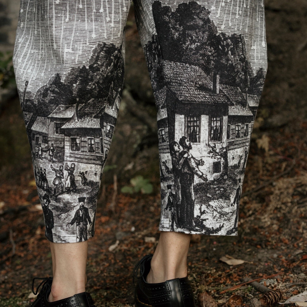 
                  
                    Model wearing Peace, Wine & Sunshine Bohéme Slip Dress featuring botanical collages and playful peace, wine and sunshine lettering on the hem – Market of Stars.
                  
                