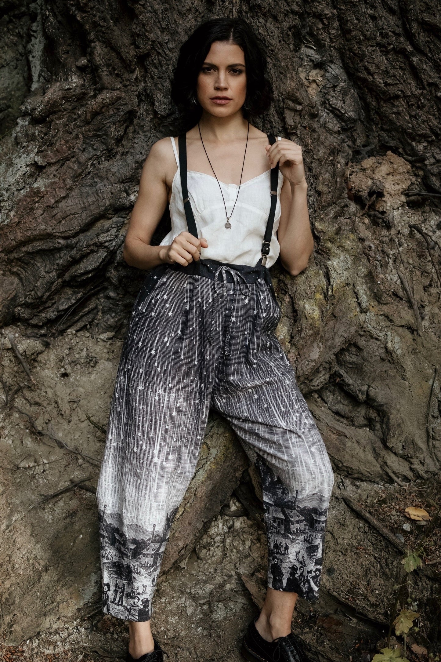 Model wearing Peace, Wine & Sunshine Bohéme Slip Dress featuring botanical collages and playful peace, wine and sunshine lettering on the hem – Market of Stars.