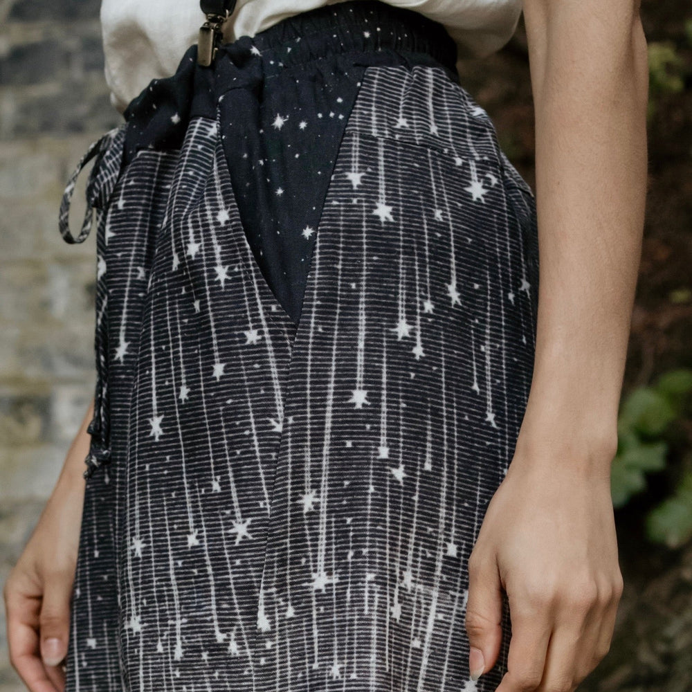 
                  
                    Model wearing Peace, Wine & Sunshine Bohéme Slip Dress featuring botanical collages and playful peace, wine and sunshine lettering on the hem – Market of Stars.
                  
                