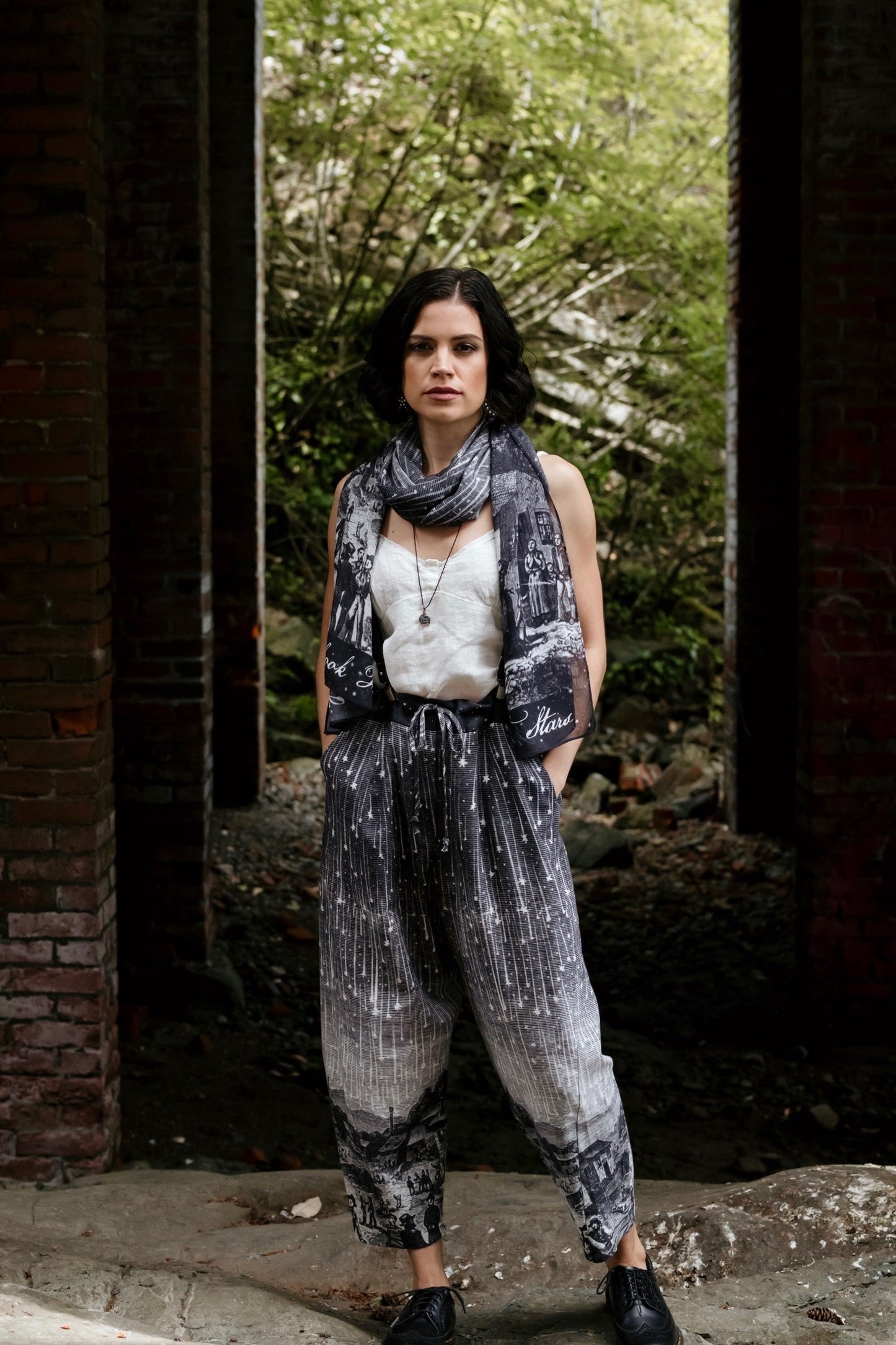 Model wearing Peace, Wine & Sunshine Bohéme Slip Dress featuring botanical collages and playful peace, wine and sunshine lettering on the hem – Market of Stars.