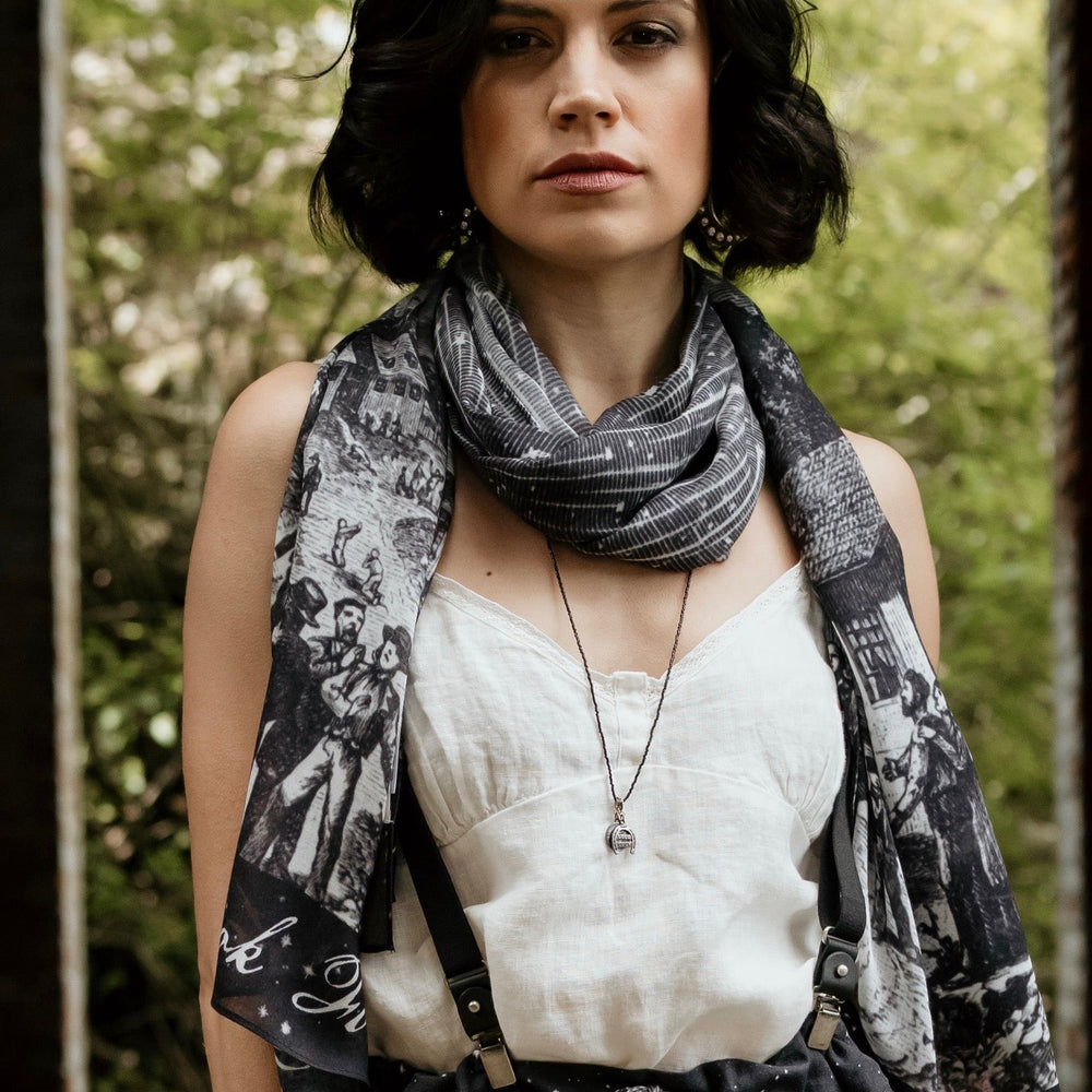 Model wearing the Stargazer Scarf featuring antique night sky illustrations and the quote "When it's dark, look for stars" – Market of Stars