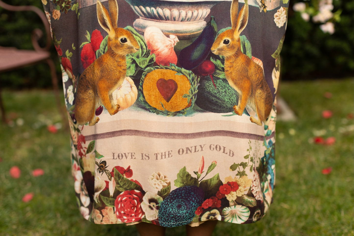 Model wearing Stay Gold Opera Duster with wildflower, bee, and bunny rabbit illustrations, golden script, and vintage collage in full-length kimono silhouette – Market of Stars