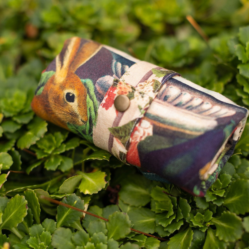 
                  
                    Stay Gold Market Tote featuring a vibrant vintage-inspired wildflower collage with bunny rabbits and bumblebees in a sturdy cotton canvas design – Market of Stars
                  
                