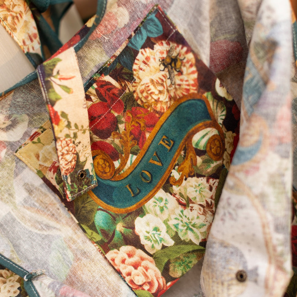 
                  
                    Stay Gold Market Tote featuring a vibrant vintage-inspired wildflower collage with bunny rabbits and bumblebees in a sturdy cotton canvas design – Market of Stars
                  
                